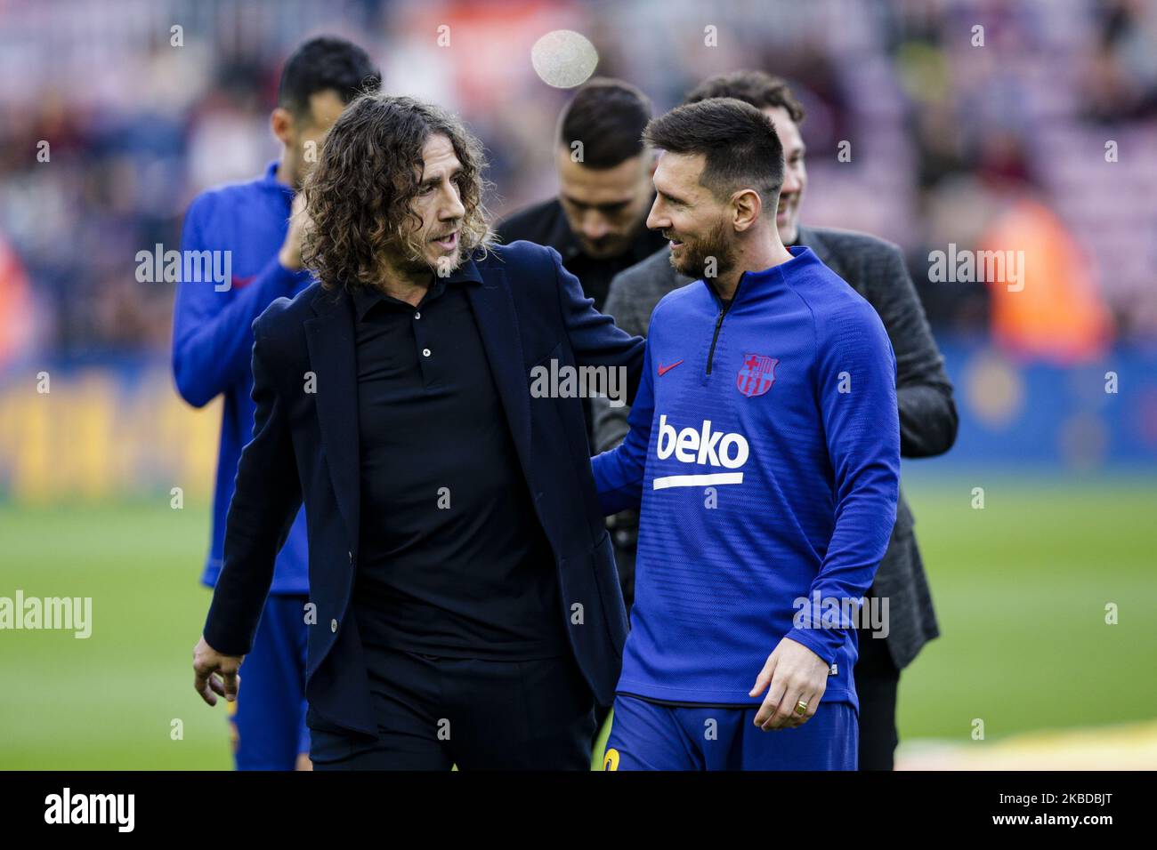 Carles Puyol and Lionel Messi during La Liga match between FC Barcelona and Deportivo Alaves at Camp Nou on December 21, 2019 in Barcelona, Spain. (Photo by Xavier Bonilla/NurPhoto) Stock Photo