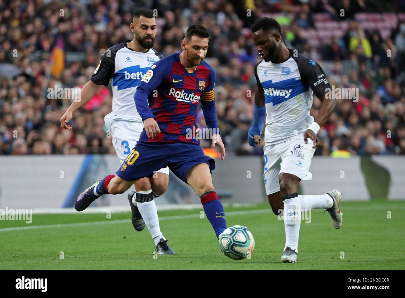 Mubarak Wakaso, Ruben Duarte and Leo Messi during the match between FC Barcelona and Deportivo Alaves, corresponding to the week 18 of the Liga Santander, played at the Camp Nou Stadium, on 21th December 2019, in Barcelona, Spain. -- (Photo by Urbanandsport/NurPhoto) Stock Photo