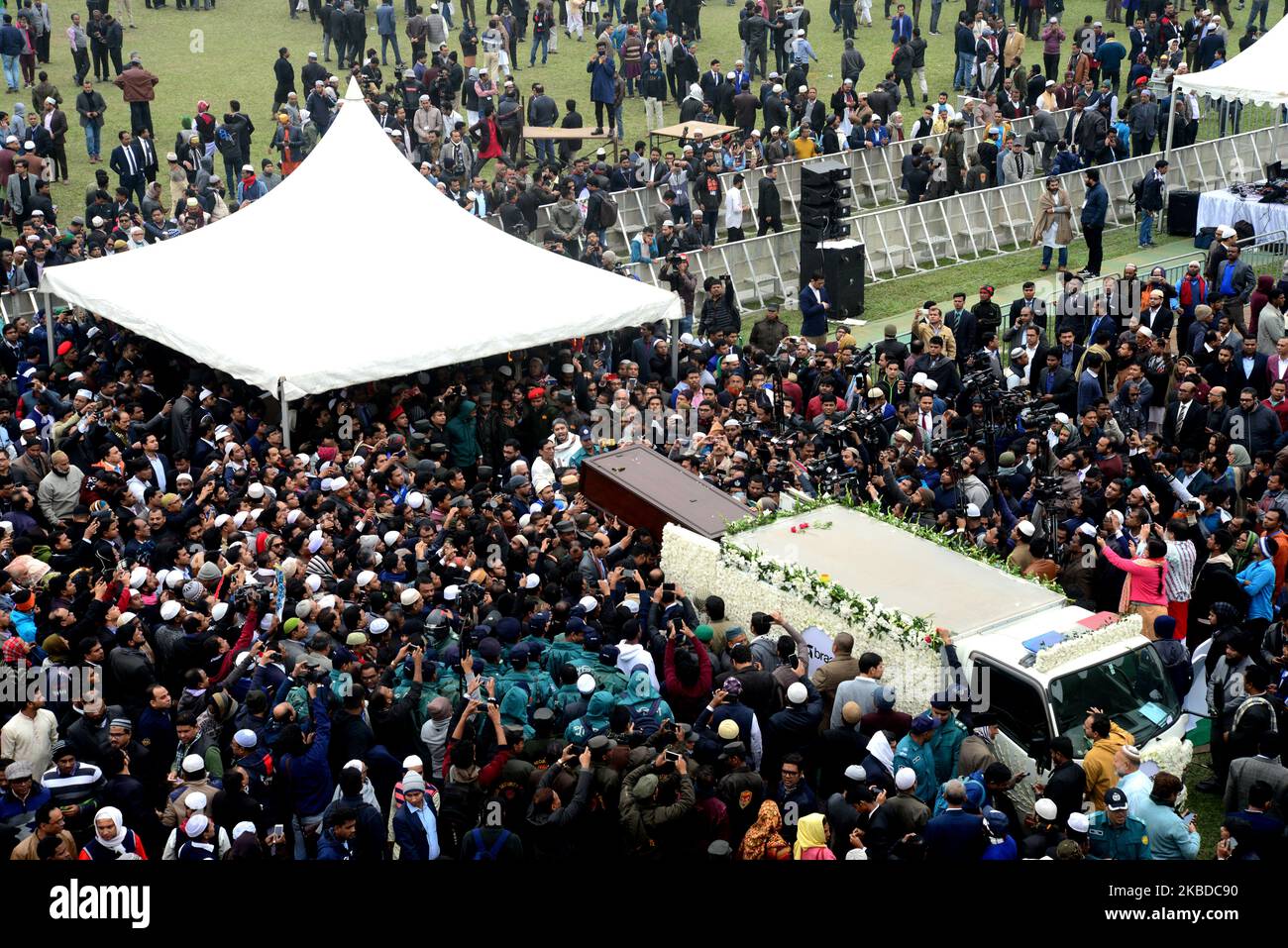 People offer funeral prayers for Sir Fazle Hasan Abed, the founder of the Bangladesh Rural Advancement Committee (BRAC), in Dhaka, Bangladesh, on December 22, 2019. Thousands gathered in Bangladesh's capital on December 22 to attend the funeral of Sir Fazle Hasan Abed, founder of BRAC, one of the world's largest NGOs, to show their final respect. (Photo by Mamunur Rashid/NurPhoto) Stock Photo