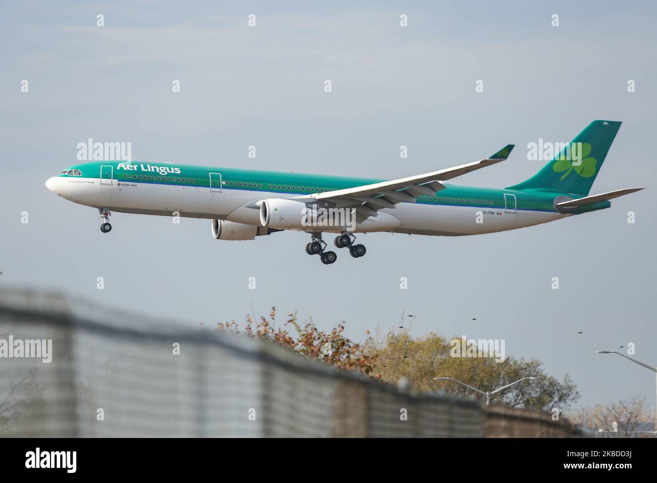 Aer Lingus Airbus A330-300 aircraft as seen on final approach landing at New York JFK John F. Kennedy International Airport on 14 November 2019. The airplane has the registration EI-FNH, 2x GE jet engines and the name St Laurence O'Toole / Lorcan O Tuathail. Aer Lingus with IATA code EI, ICAO EIN and Callsign Shamrock is the flag carrier airline of Ireland based in the Irish Capital Dublin and member of Oneworld aviation alliance. (Photo by Nicolas Economou/NurPhoto) Stock Photo