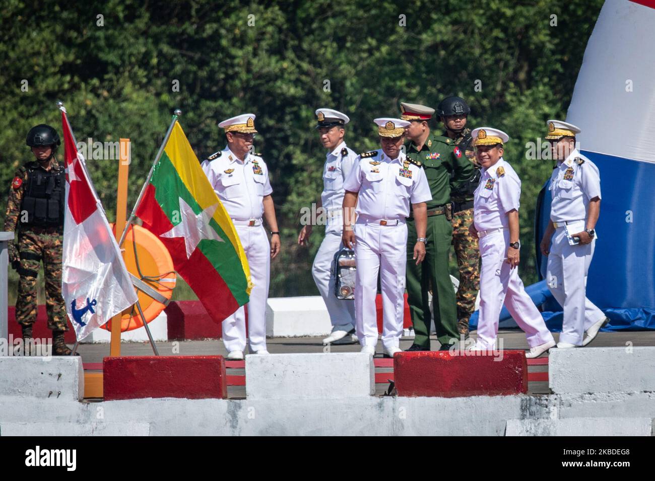 Myanmar military commander in chief Senior General Min Aung Hlaing, surrounded by high-ranking military officials, arrives to attend a ceremony to mark the Myanmar Navy 72nd anniversary at Irrawaddy Naval Region Command headquarters in Yangon, Myanmar on December 24, 2019. (Photo by Shwe Paw Mya Tin/NurPhoto) Stock Photo