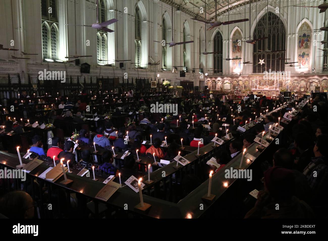 People participate the Mid Night Candle Light pray at the St Paul's 