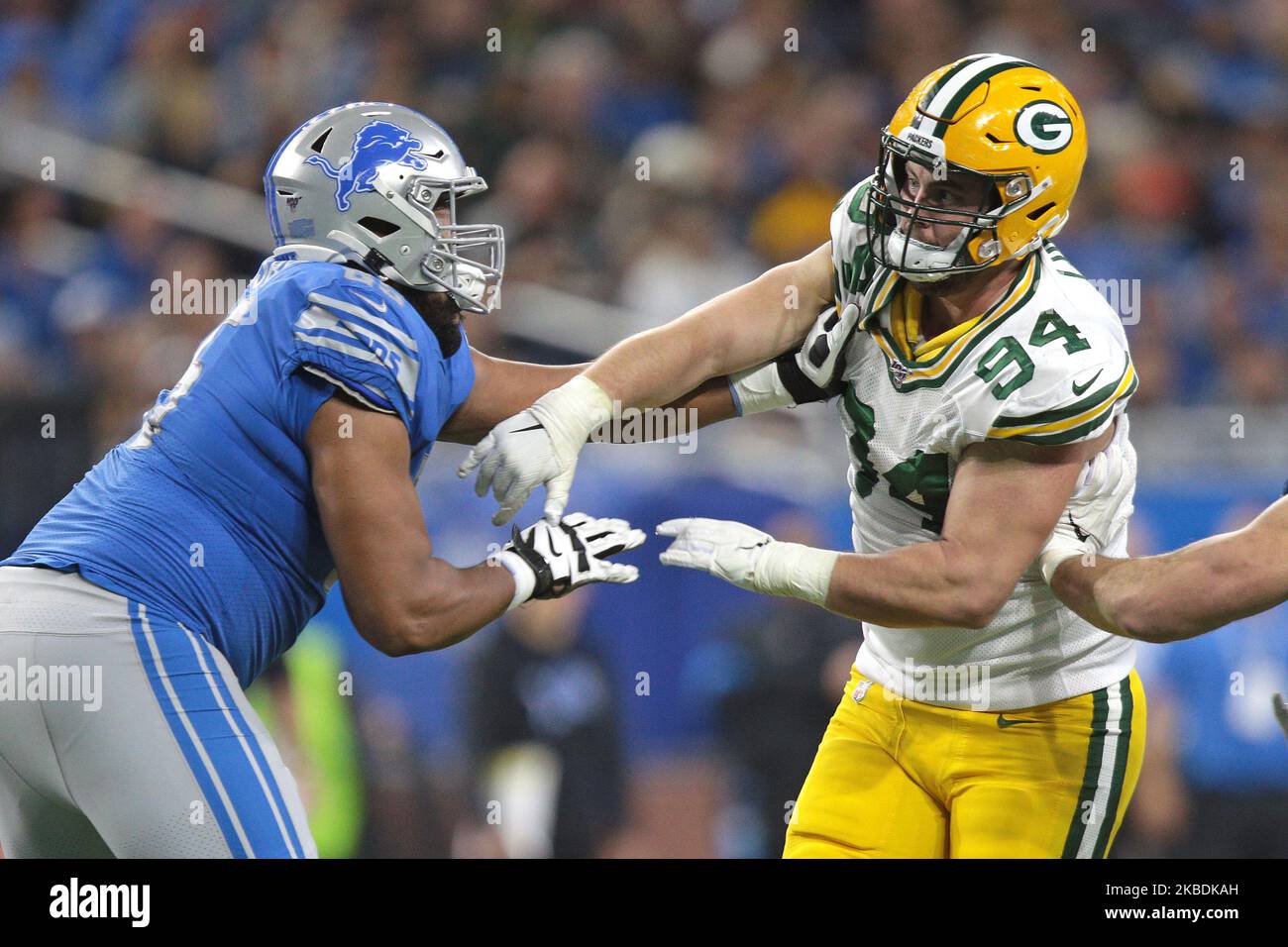 Green Bay Packers defensive end Dean Lowry (94) is blocked by Detroit Lions  offensive tackle Penei Sewell (58) during the first half of an NFL football  game Sunday, Nov. 6, 2022, in