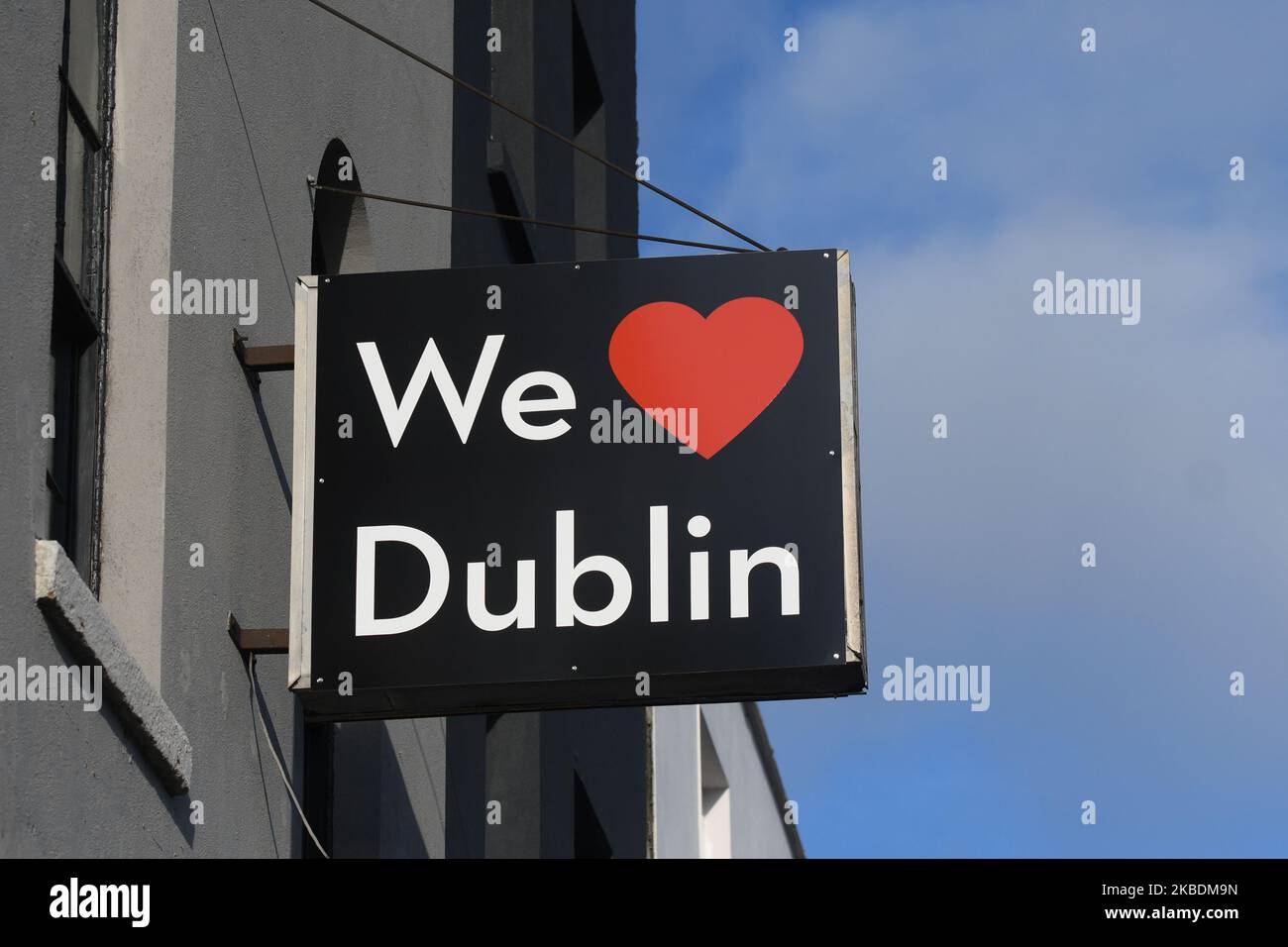 'We love Dublin' sign attached to an old building in Dublin's center