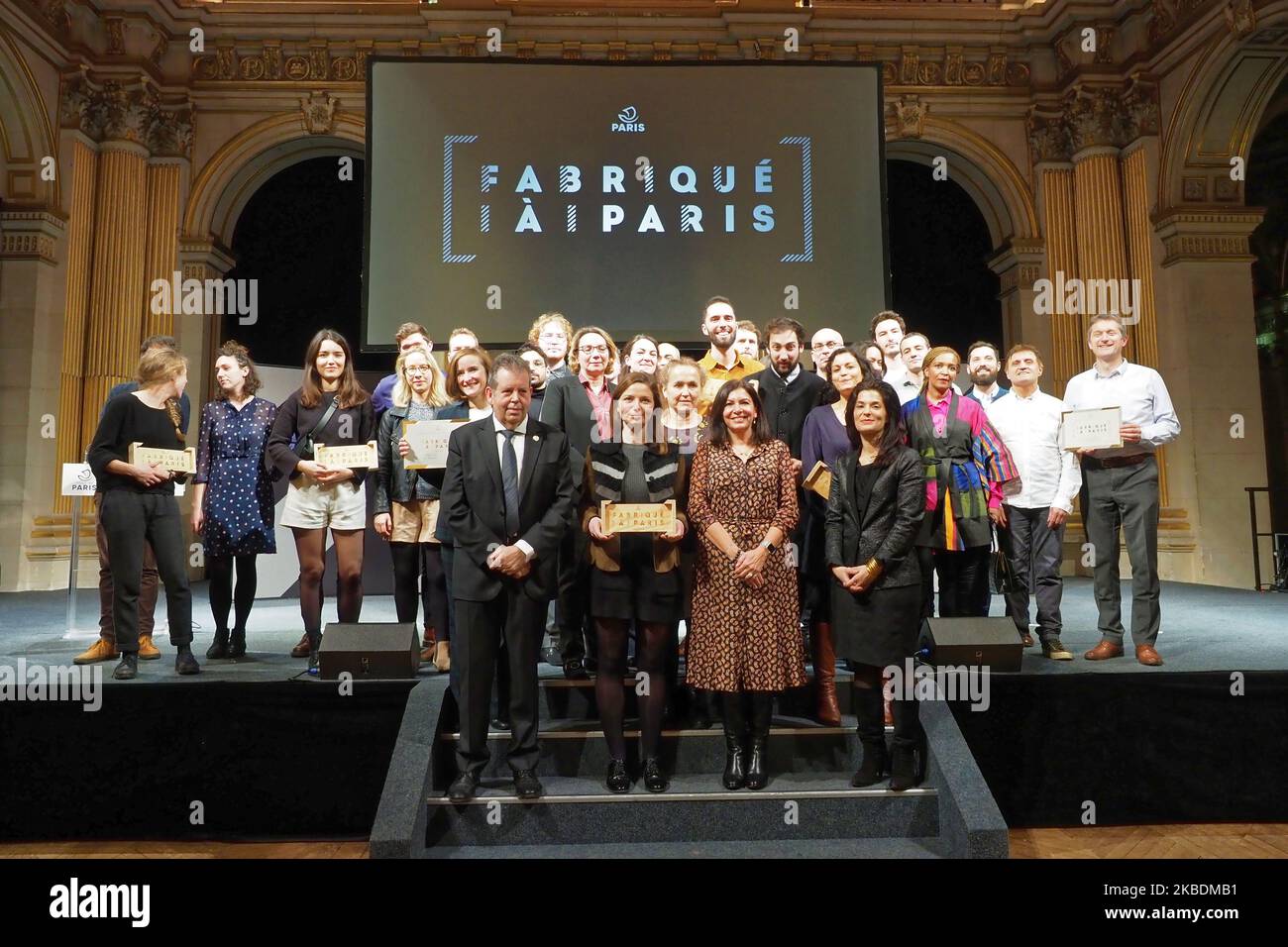 Prize winners for the contest Made in Paris with mayor of Paris Anne Hidalgo (C) - December 19, 2019, Paris (Photo by Daniel Pier/NurPhoto) Stock Photo