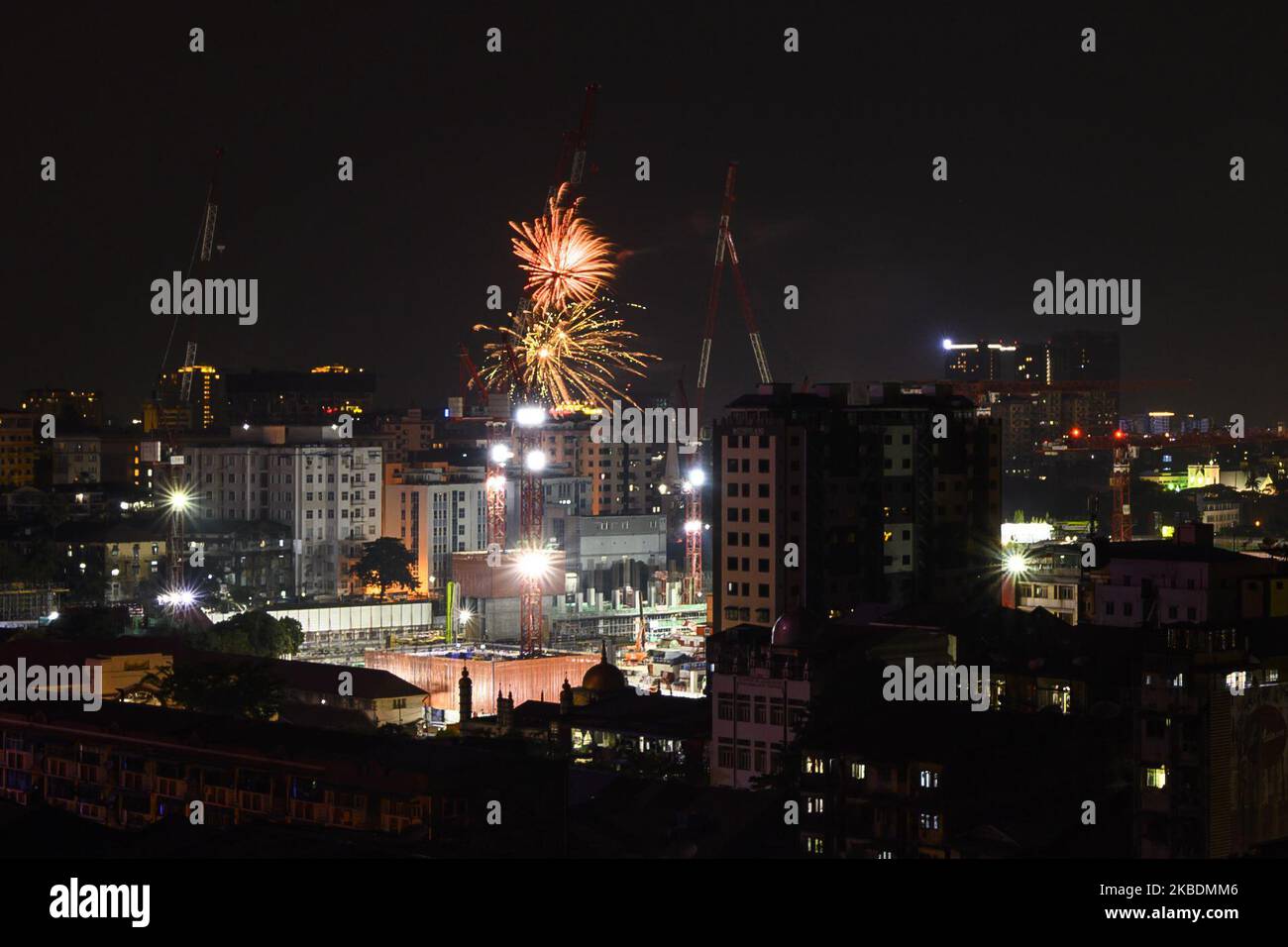 Fireworks explode around downtown area during New Year's Eve celebrations in Yangon, Myanmar on 01 January, 2020. (Photo by Shwe Paw Mya Tin/NurPhoto) Stock Photo