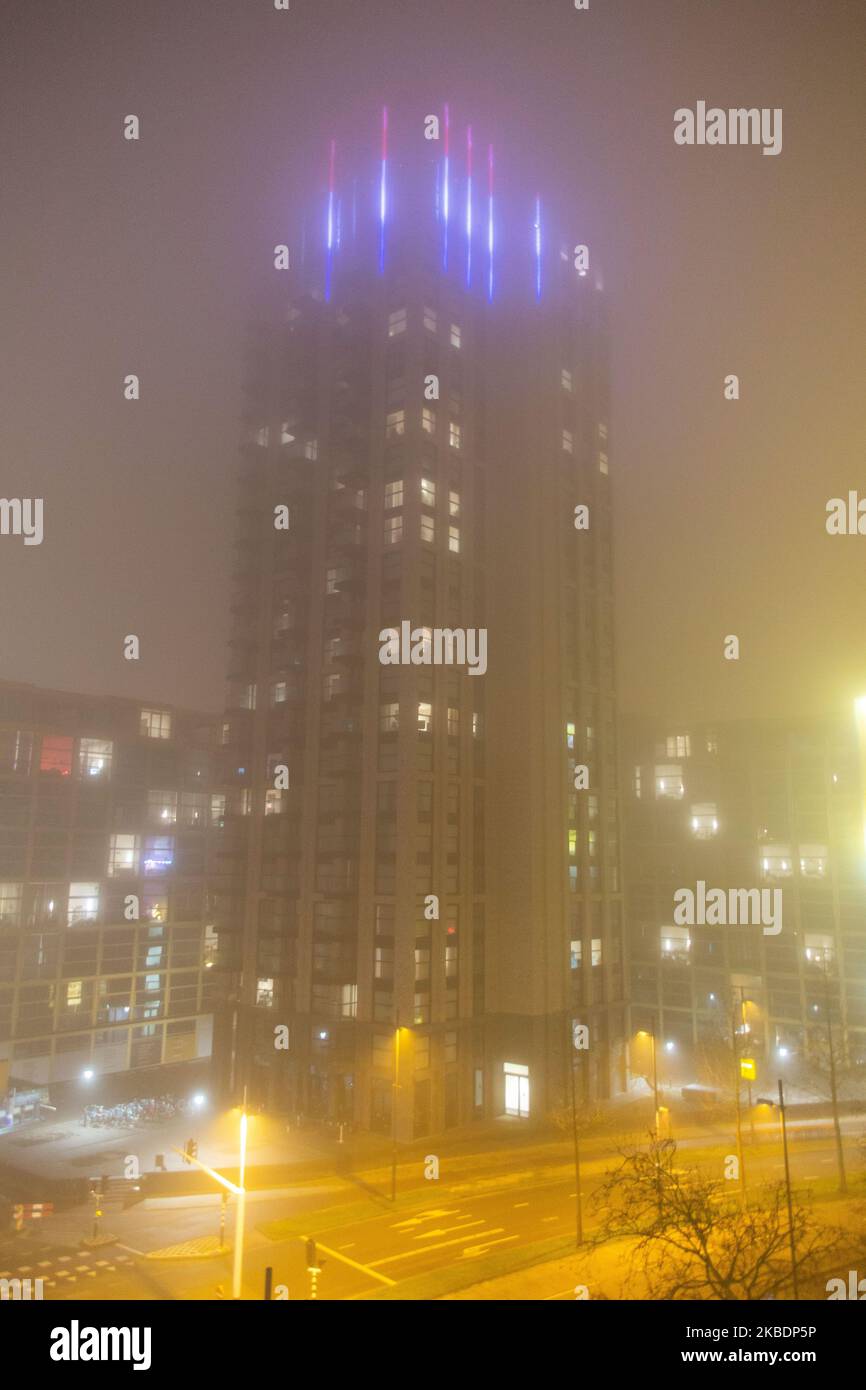 Fog in the city center of the Dutch town of Eindhoven. Low temperature, cold winter weather, low visibility, dense mist and reduced traffic during the first night of the year 2020. Eindhoven, The Netherlands - January 1, 2020 (Photo by Nicolas Economou/NurPhoto) Stock Photo