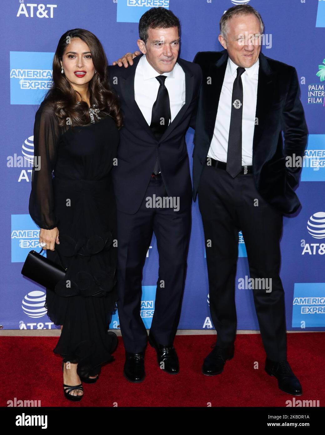 PALM SPRINGS, CALIFORNIA, USA - JANUARY 02: Salma Hayek, Antonio Banderas and Francois-Henri Pinault arrive at the 31st Annual Palm Springs International Film Festival Awards Gala held at the Palm Springs Convention Center on January 2, 2020 in Palm Springs, California, United States. (Photo by Xavier Collin/Image Press Agency/NurPhoto) Stock Photo