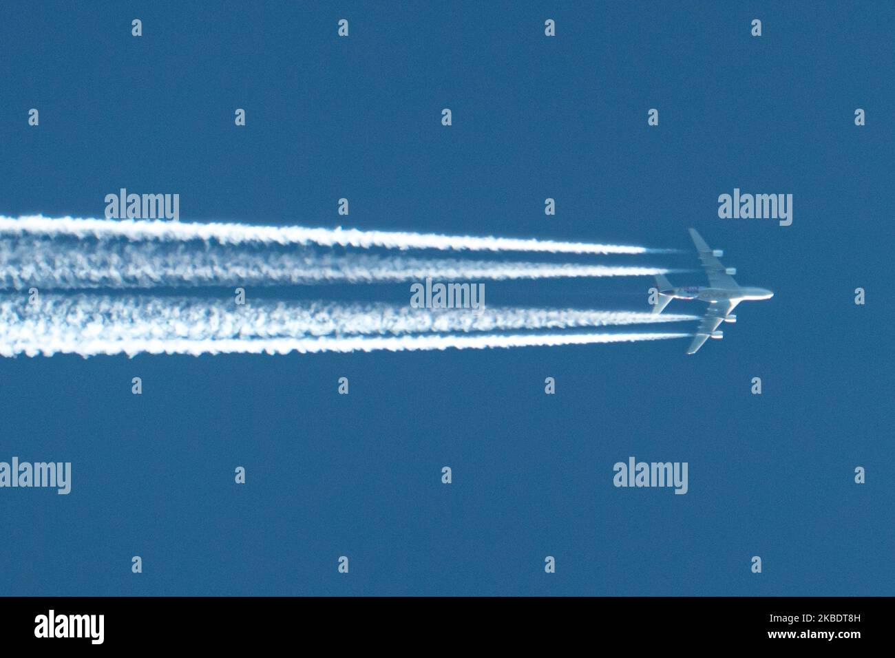 Airbus a380 commercial passenger jet flying at cruising altitude hires stock photography and