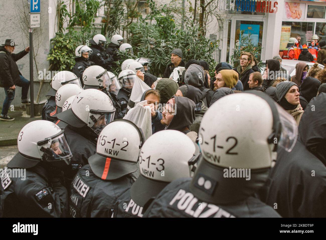 Polices block the counter protest groups, while right wing groups ...