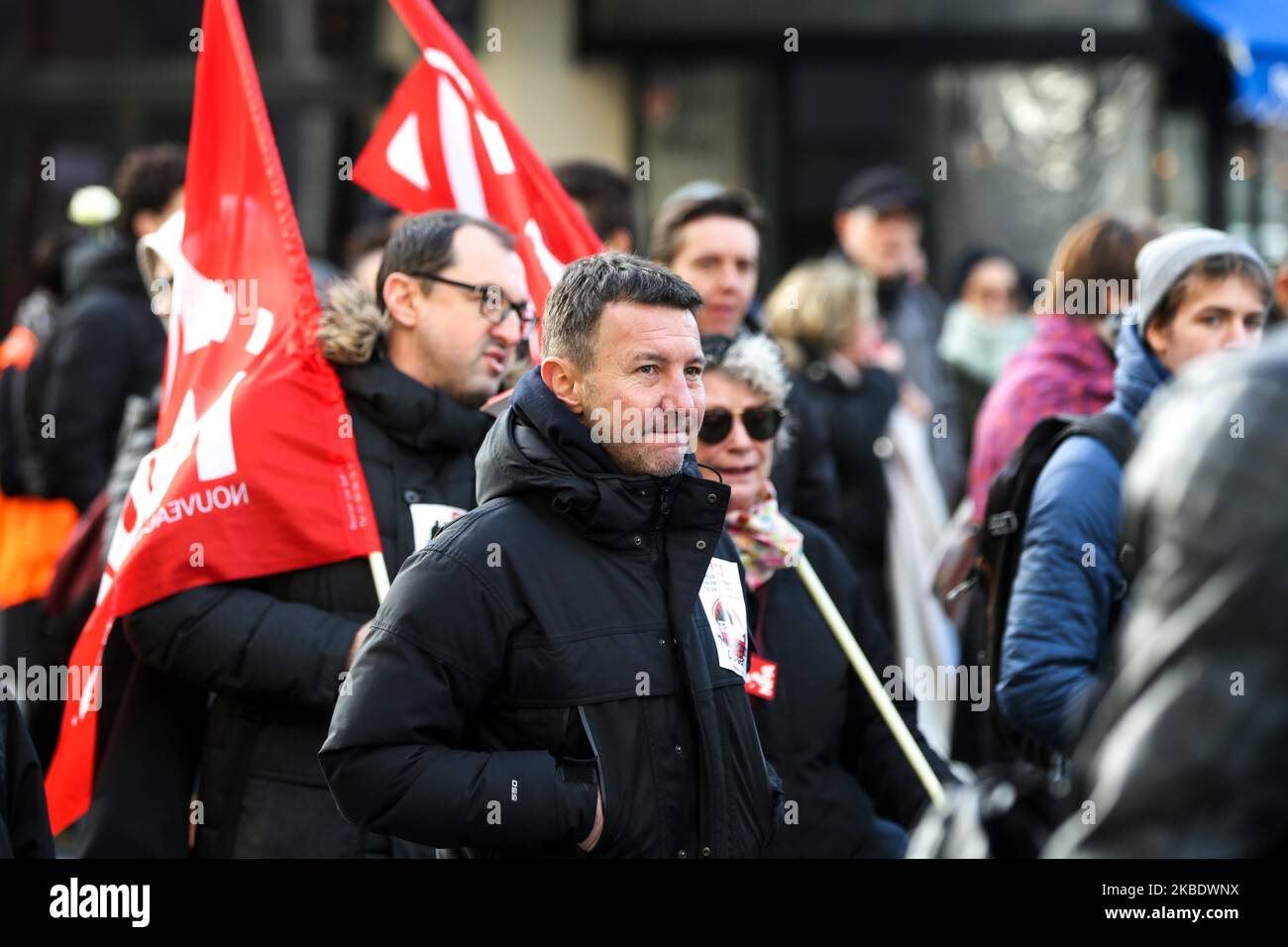 Spokesperson of French far-left party NPA Olivier Besancenot (C) takes part in a demonstration called by French national trade union General Confederation of Labour (CGT) against the pension reform on January 4, 2020, in front of the Gare de Lyon train station in Paris, on January 4,2020. After 30 days of strike, unions opposed to the pension reform promise not to give respite next week to the government, before the resumption of consultations on January 7,2020. (Photo by Michel Stoupak/NurPhoto) Stock Photo