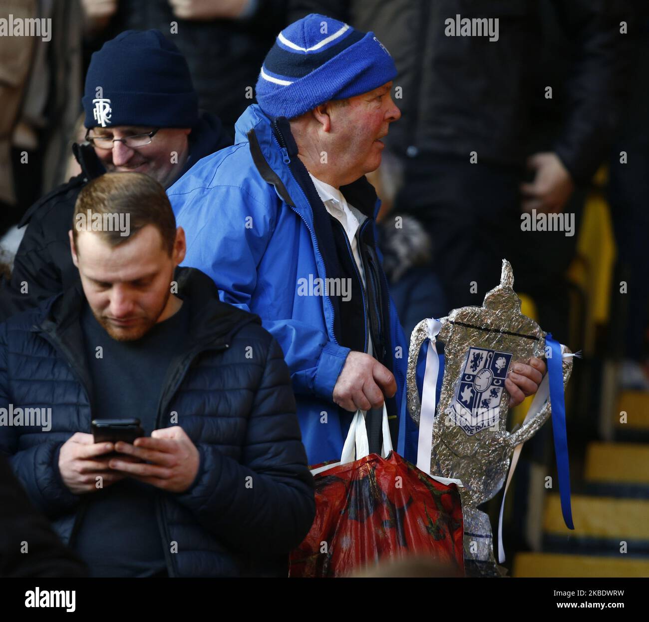 Tranmere Rovers Fan holding FA Cup during Emirates FA Cup Third Round match between Watford and Tranmere Rovers on January 04 2020 at Vicarage Road Stadium, Watford, England. (Photo by Action Foto Sport/NurPhoto) Stock Photo