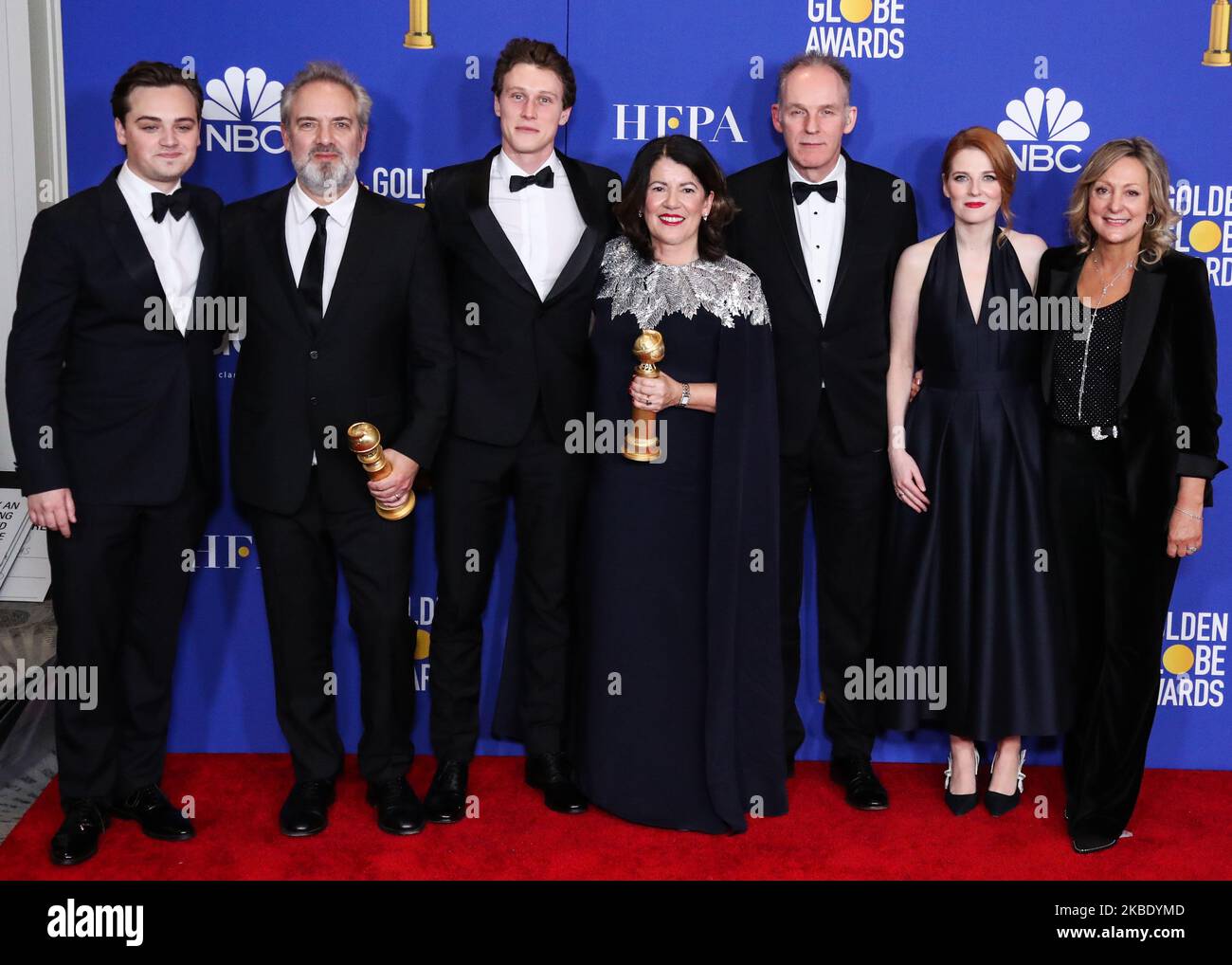 BEVERLY HILLS, LOS ANGELES, CALIFORNIA, USA - JANUARY 05: Dean-Charles Chapman, Sam Mendes, George MacKay, Pippa Harris, Callum McDougall, Krysty Wilson-Cairns and Jayne-Ann Tenggre pose in the press room at the 77th Annual Golden Globe Awards held at The Beverly Hilton Hotel on January 5, 2020 in Beverly Hills, Los Angeles, California, United States. (Photo by Xavier Collin/Image Press Agency/NurPhoto) Stock Photo