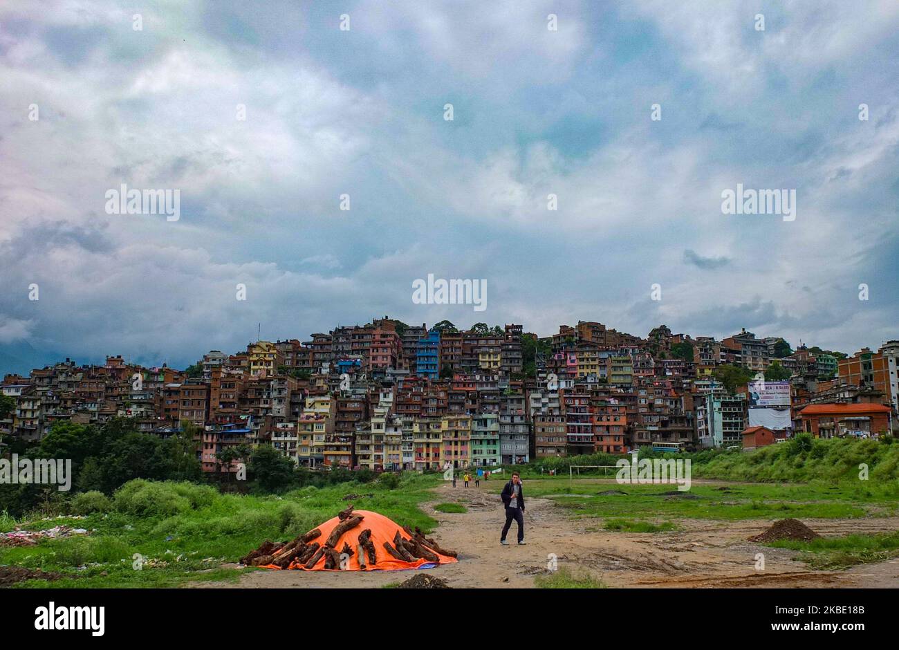 A man walks to the main roadway outside the city Kirtipur, Nepal. (Photo by John Fredricks/NurPhoto) Stock Photo