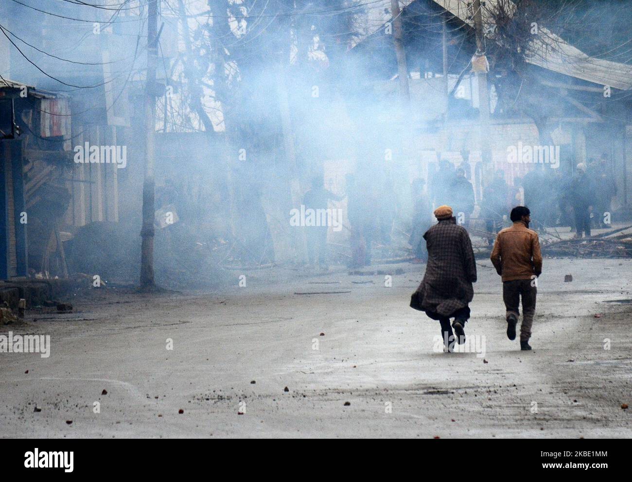 Indian police fire tear gas hi-res stock photography and images - Alamy