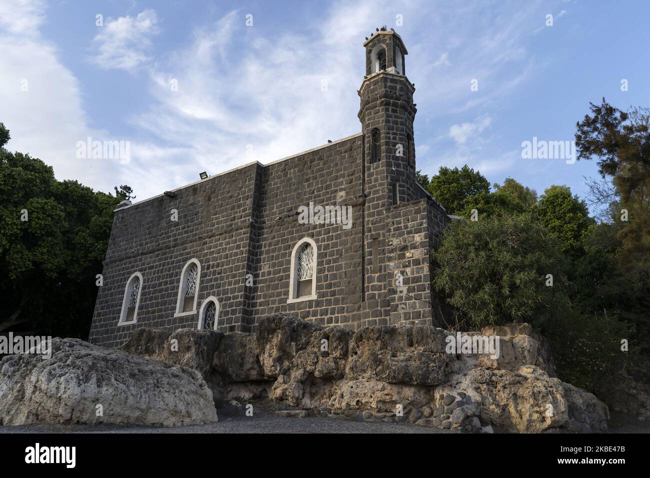 Exterior view of St. Peter's Primate Church is a Franciscan church located in Tabgha, Israel, on the northwest shore of the Sea of Galilee on 10 December 2019. She commemorates the restoration of Peter as head of the Apostles by Jesus. (Photo by Joaquin Gomez Sastre/NurPhoto) Stock Photo