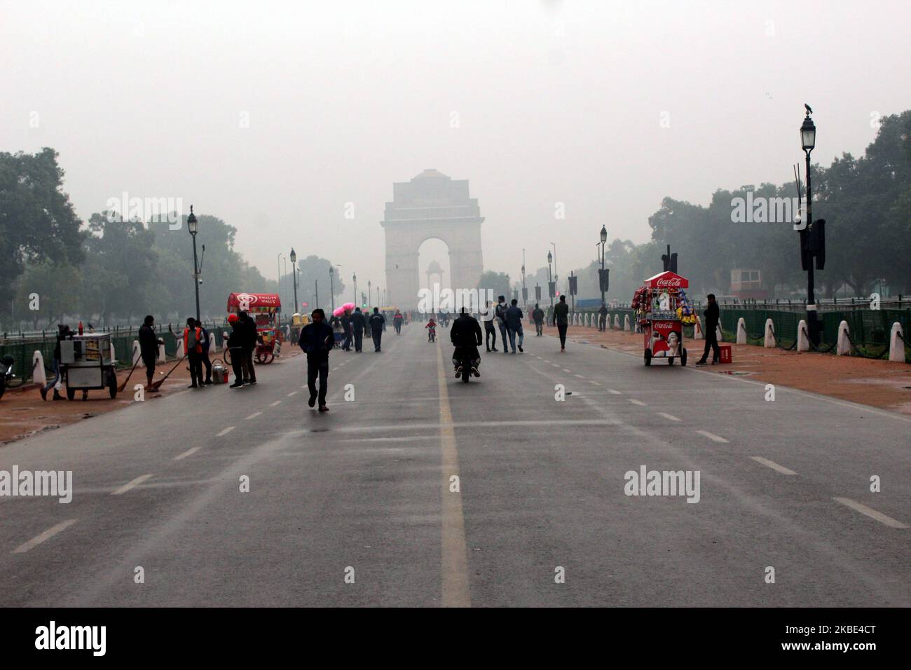 India Gate seen during light rain that brought down the temperature of the capital on January 8, 2020 in New Delhi, India. Despite the downpour, the pollution level of the national capital remained in the poor category for the third consecutive day with the air quality index at 242, said System of Air Quality and Weather Forecasting And Research (SAFAR). (Photo by Mayank Makhija/NurPhoto) Stock Photo