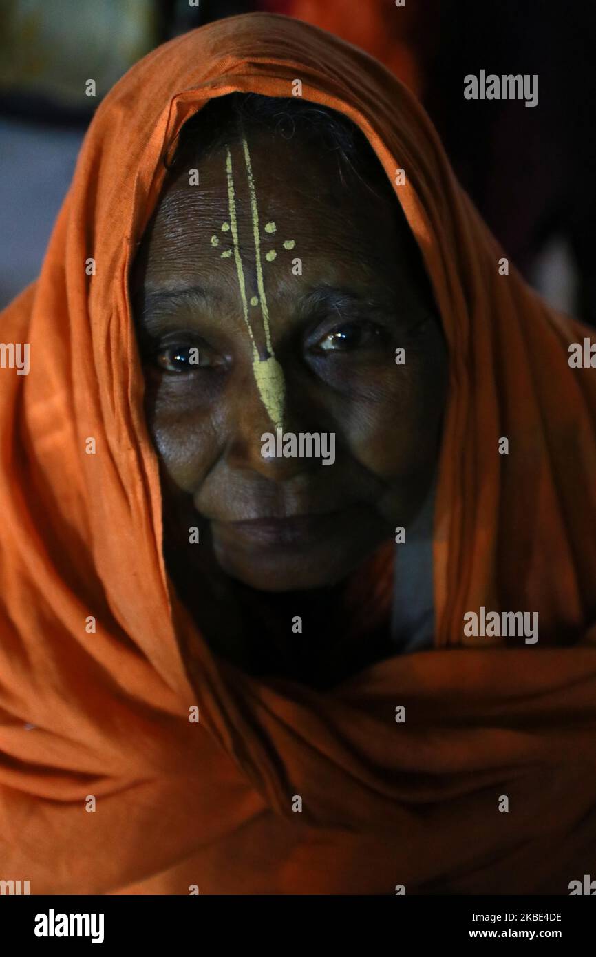 Devotee at the temporary gangasagar mela camp at Kolkata Babughat on January 08,2020 ,Kolkata ,India.Devotees have started arriving to the city for the annual holy dip at Gangasagar, the confluence of River Ganges and Bay of Bengal, about 130 kilometers (81 miles) south of Kolkata to mark Makarsankranti festival on Jan. 14. (Photo by Debajyoti Chakraborty/NurPhoto) Stock Photo