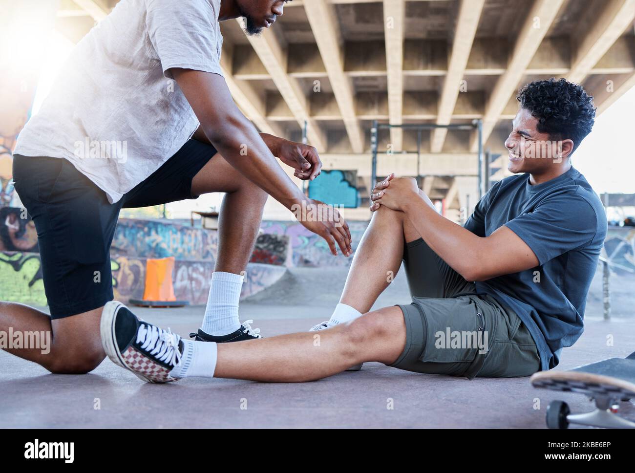 Sports injury, knee and skater man holding wound after accident