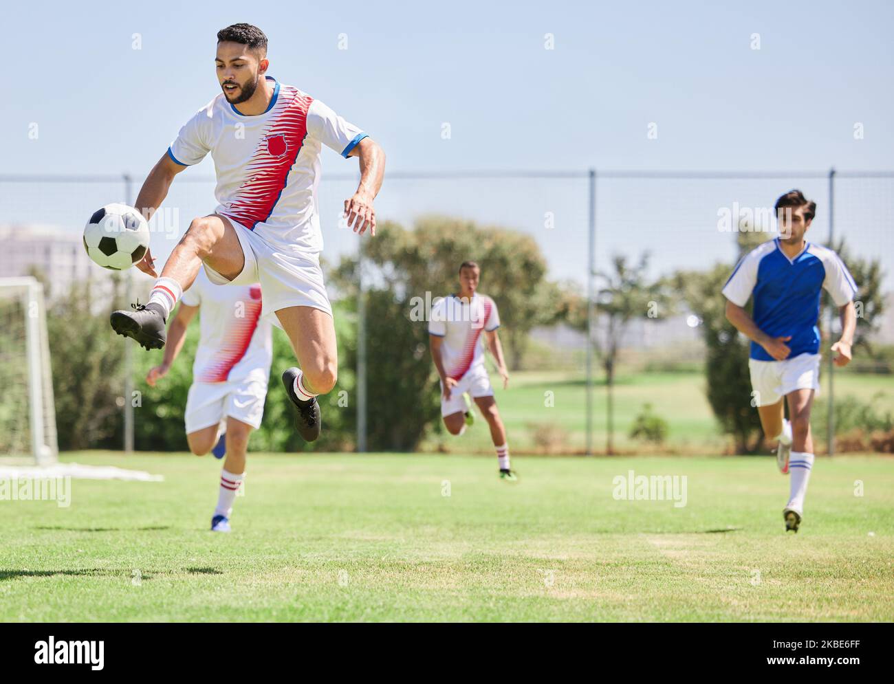 Football, soccer players in match and competition game with