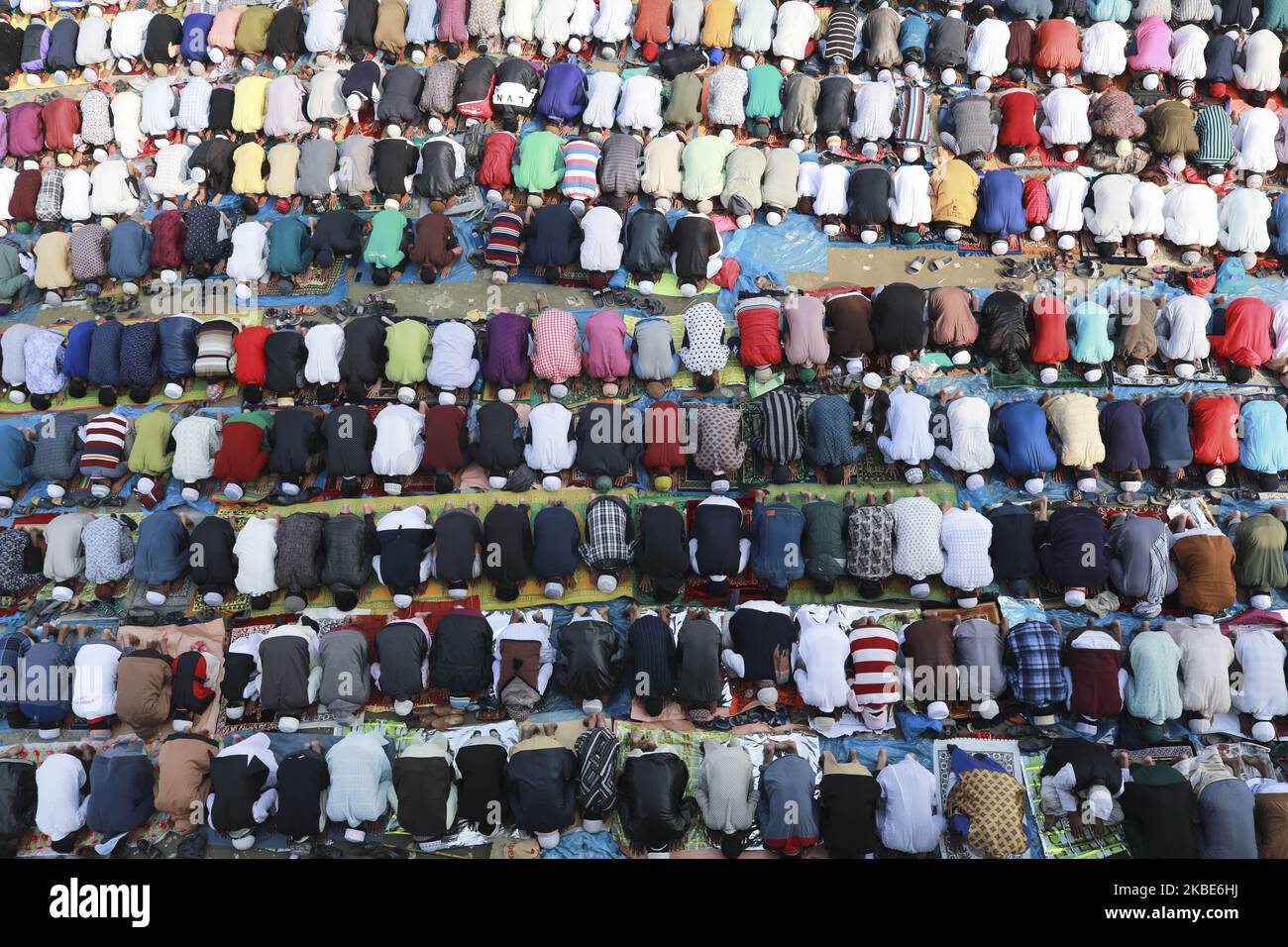 Thousands of Muslims from around the world performs Friday prayer on a street during Bishwa Ijtema, which is considered the world’s second-largest muslim gathering after haj in Tongi, outskirt of Dhaka on january 10, 2020. (Photo by Kazi Salahuddin Razu/NurPhoto) Stock Photo