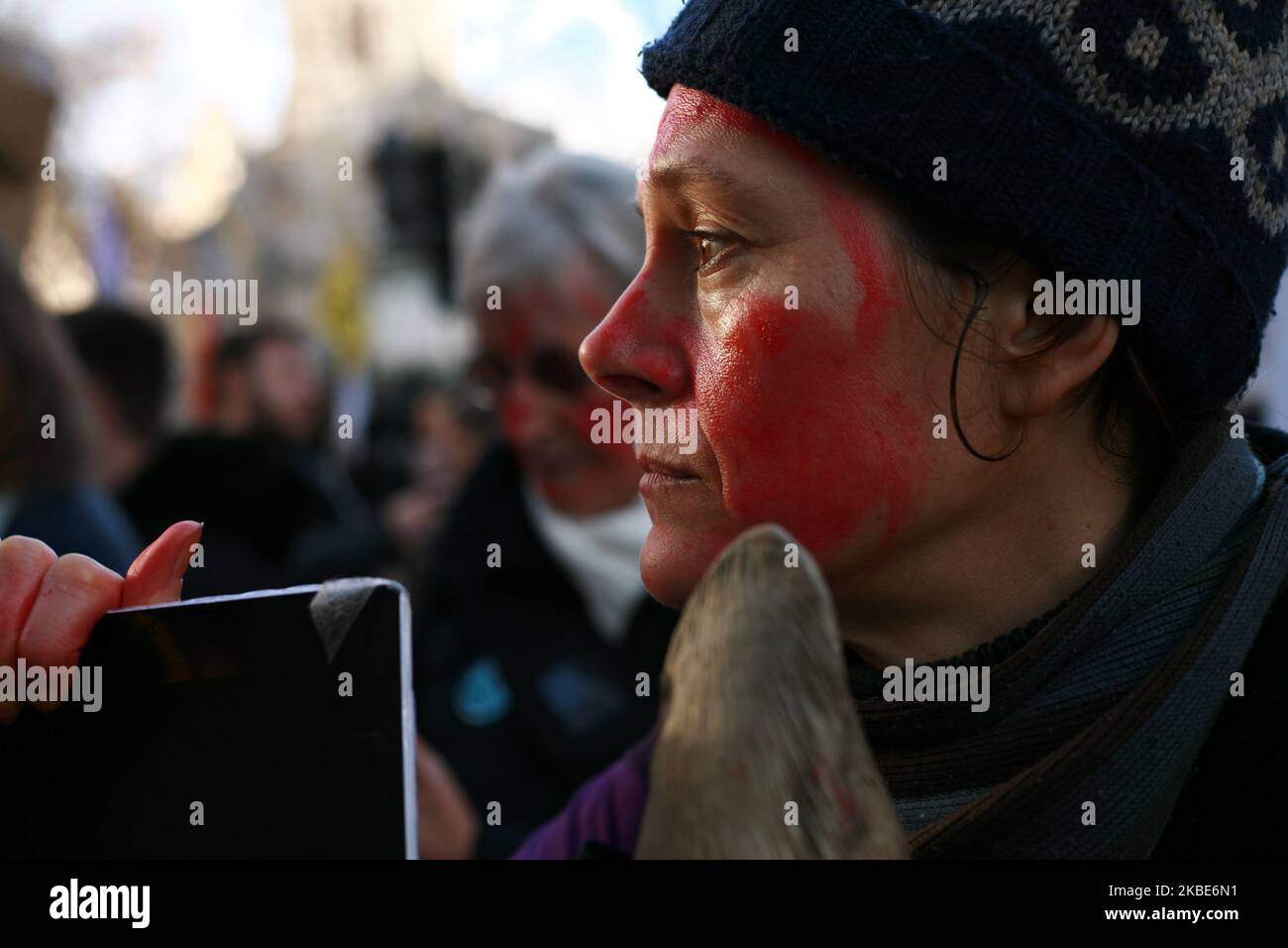 A member of climate change activist movement Extinction Rebellion (XR) protests against kangaroo killing during an XR-organised demonstration against the Australian government's response to its ongoing bushfires emergency held outside the Australian High Commission in London, England, on January 10, 2020. Wildfires have burned more than 12 million acres of Australian land since beginning in September last year, with the states of New South Wales and Victoria most severely affected, and with the fire season still far from over. Australian Prime Minister Scott Morrison is facing intense criticis Stock Photo