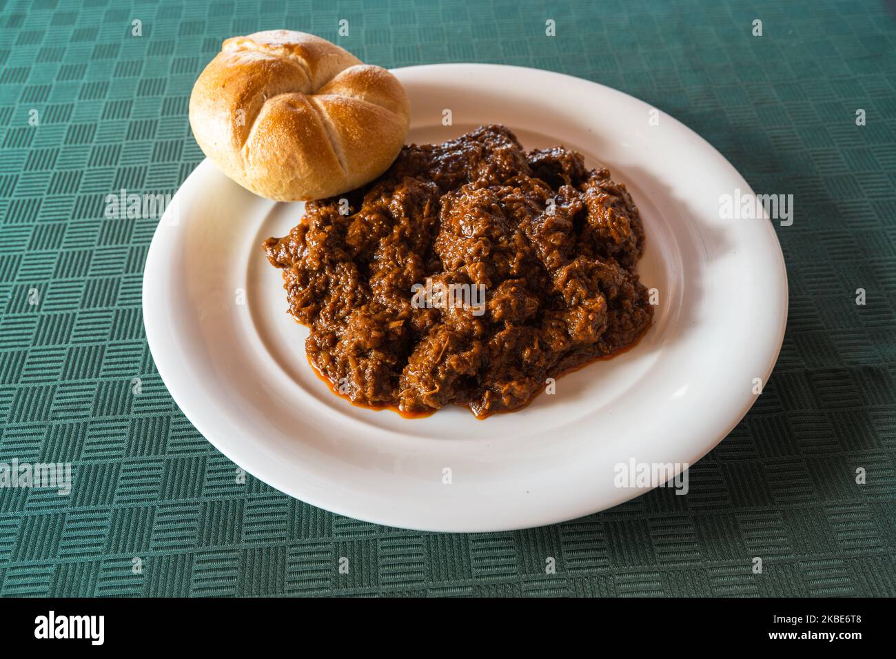 Viennes Goulash or Wiener Saftgulasch with a Kaiser Roll made with Beef and Paprika Stock Photo