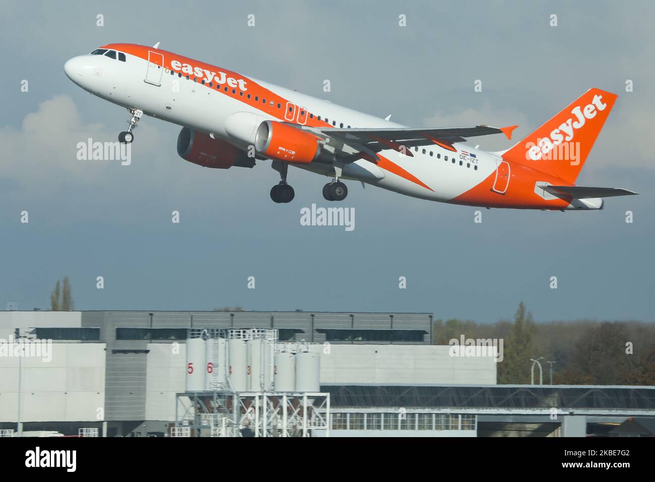 An EasyJet Europe Airline Airbus A320-200 narrow body commercial airplane as seen on rotation and take off from Brussels Internation Airport Zaventem BRU EBBR during a blue sky day on 11 January 2020in Brussels, Belgium. The aircraft has the registration OE-IZT with 2x CMFI jet engines. EasyJet Europe is an Austrian low-cost airline based in Vienna Austria subsidiary of the British low cost budget airline Easy Jet. The carrier connects the Belgian capital to Basel Mulhouse, Geneva, Berlin Tegel, Bordeaux and Nice. (Photo by Nicolas Economou/NurPhoto) Stock Photo