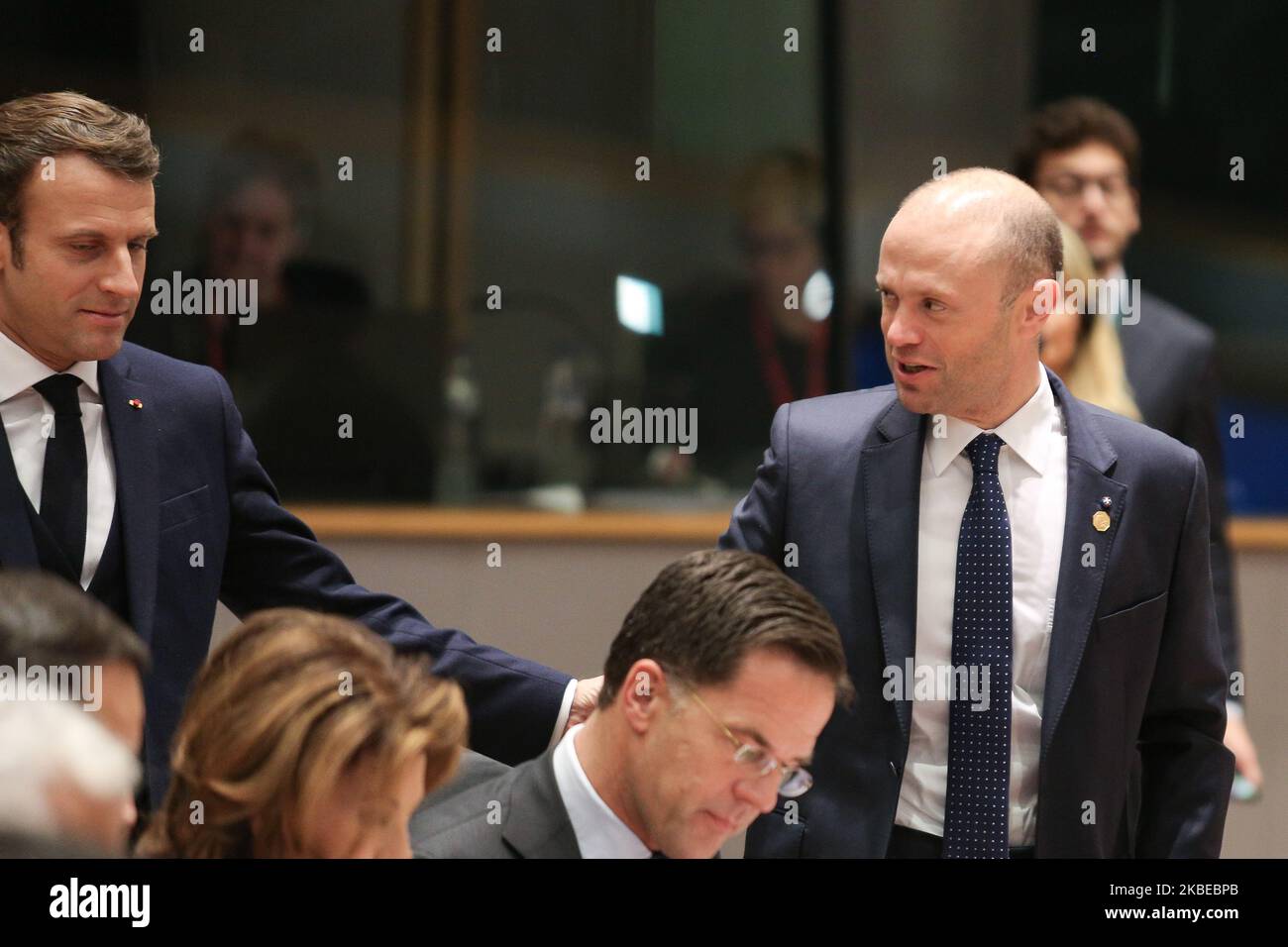 Joseph Muscat talking with President of France Emmanuel Macron. Joseph Muscat Prime Minister of the Republic of Malta, an island country in the Mediterranean. The Maltese PM, a politician, Leader of the Partit Laburista, a social-democratic political party as seen on the round table room during the second day of the European Council - EURO summit - EU leaders meeting, at the headquarters of European Union on December 13, 2019 in Brussels, Belgium. (Photo by Nicolas Economou/NurPhoto) Stock Photo