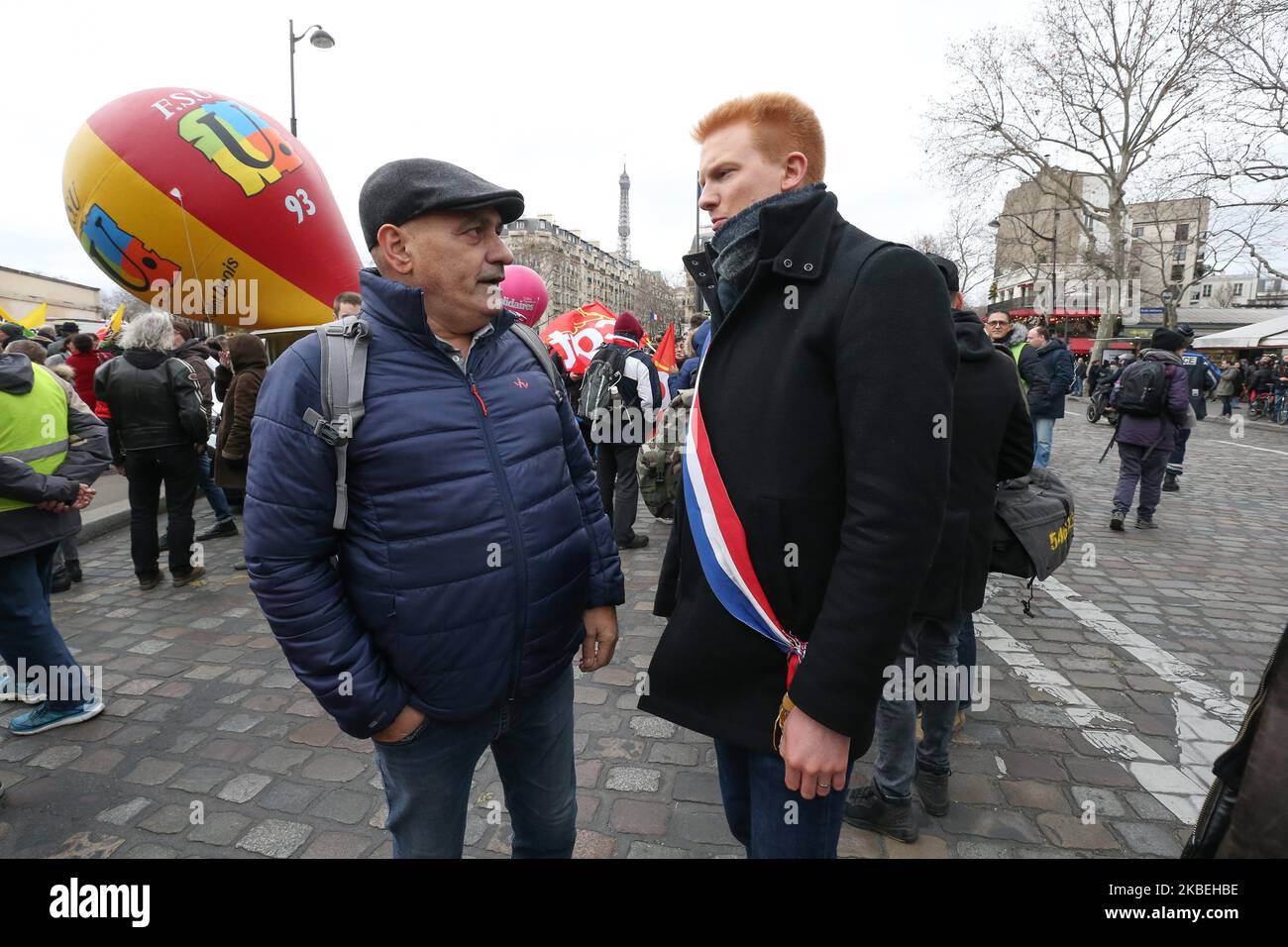 French leftist party La France Insoumise (LFI) MP Adrien Quatennens (R) takes part in a demonstration in front the Tour Eiffel in Paris on January 14, 2020, as part of a nationwide multi-sector strike against the French government's pensions overhaul. A transport strike dragged on into its 41st day on January 14, with both the French government and hardline unions digging in on the pension reforms that sparked the standoff. (Photo by Michel Stoupak/NurPhoto) Stock Photo