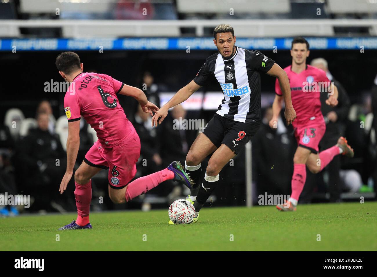 Joelinton of Newcastle United in action with Eoghan O'Connell of Rochdale during the FA Cup match between Newcastle United and Rochdale at St. James's Park, Newcastle on Tuesday 14th January 2020. (Photo by Mark Fletcher/MI News/NurPhoto) Stock Photo