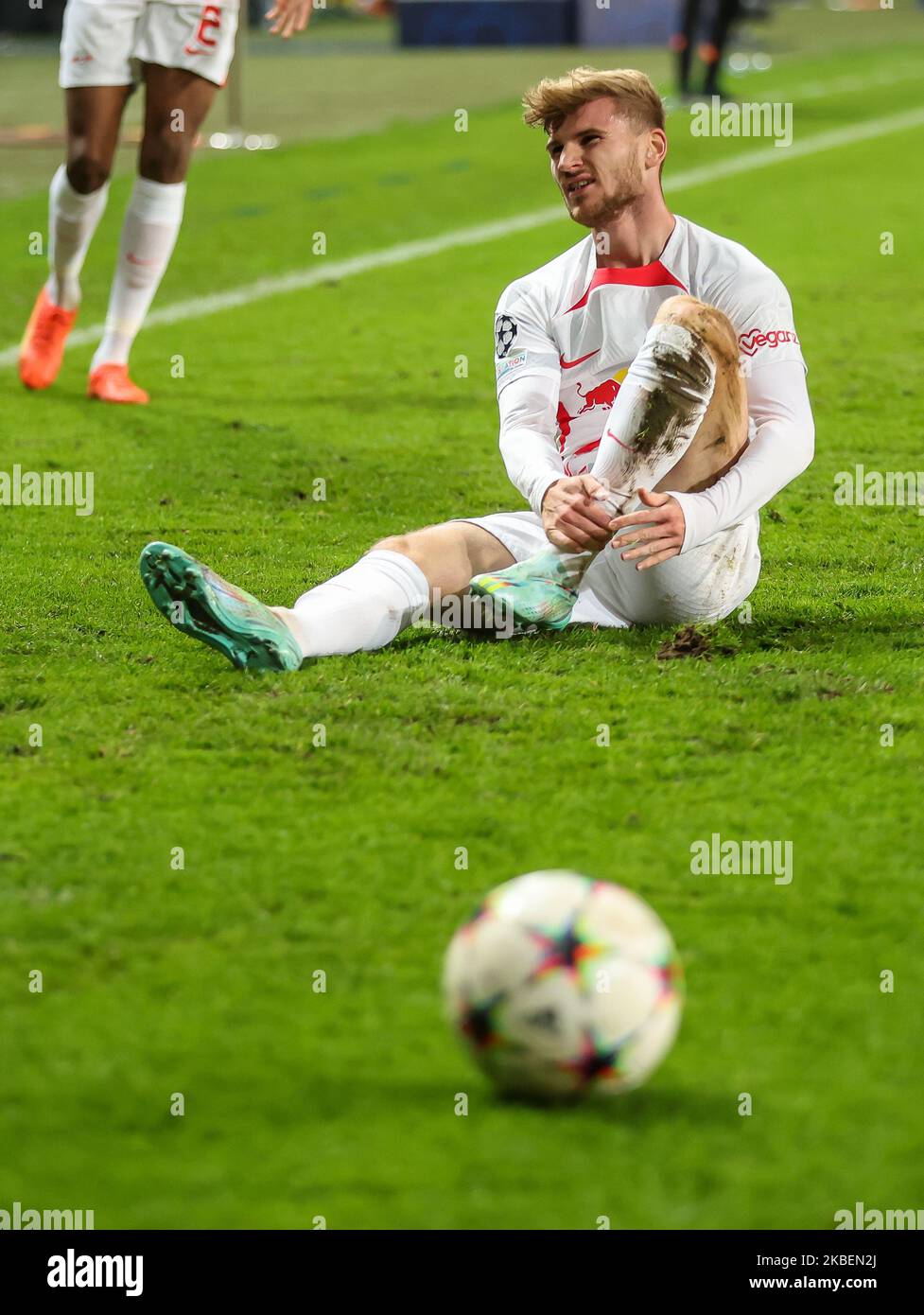 Warschau, Poland. 02nd Nov, 2022. Soccer: Champions League, Group stage, Group F, Matchday 6 Shakhtyor Donetsk - RB Leipzig at Wojska Polskiego Stadion. Leipzig's player Timo Werner holds his ankle after a foul. Credit: Jan Woitas/dpa/Alamy Live News Stock Photo