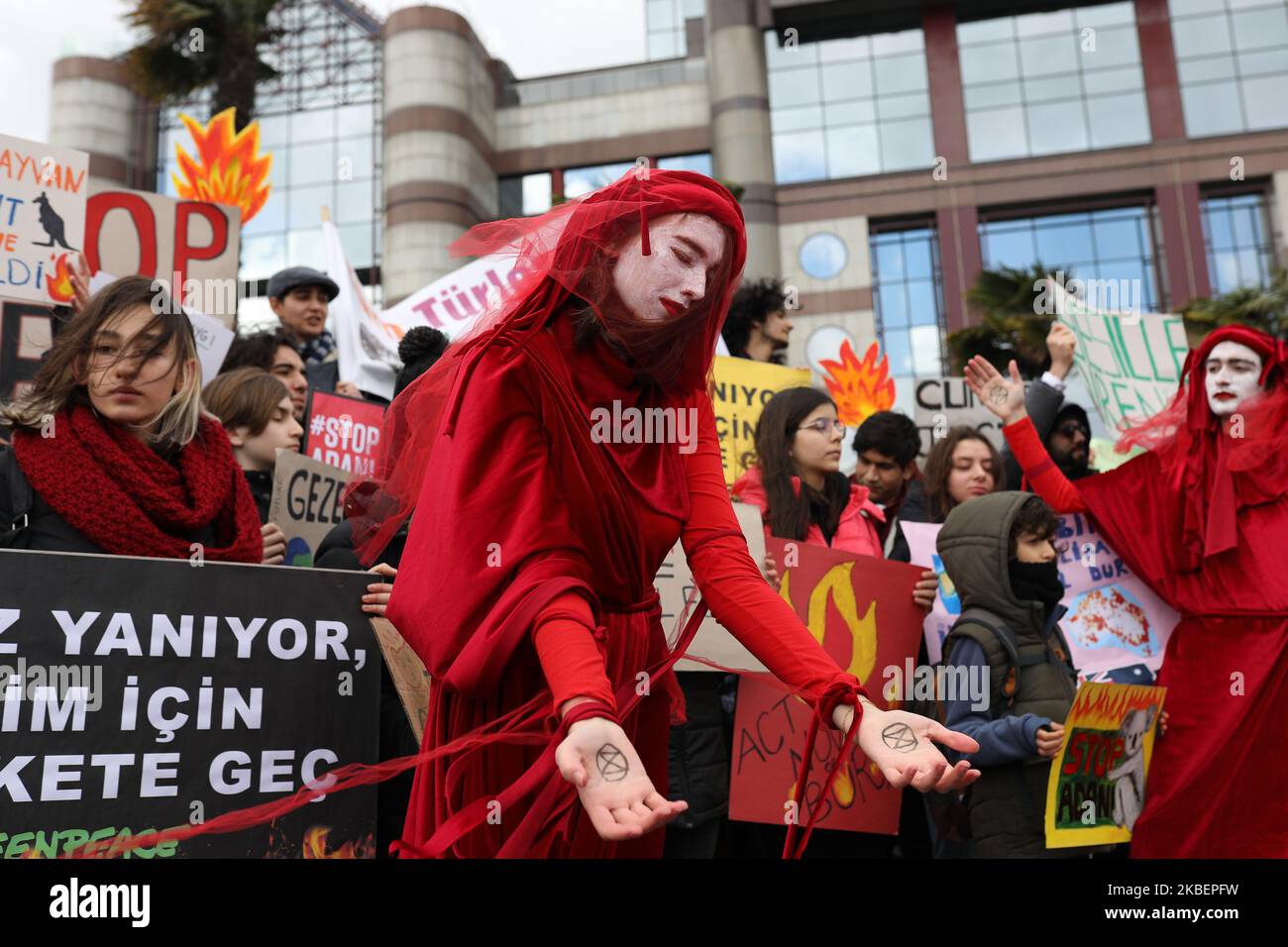 Students in Istanbul gathered for a protest in front of the Australian Consulate in Istanbul on January 17, 2020, in relation to the recent fires in Australia and the climate crisis. The demonstration was organized by Fridays for Future Turkey, and was supported by the ecologist groups Extinction Rebellion Turkey, Zero Future Campaign, HAYDI, Istanbul Vegan Initiative and Eco Student. Representation of the Red Brigades seen during the demonstration. (Photo by Erhan Demirtas/NurPhoto) Stock Photo