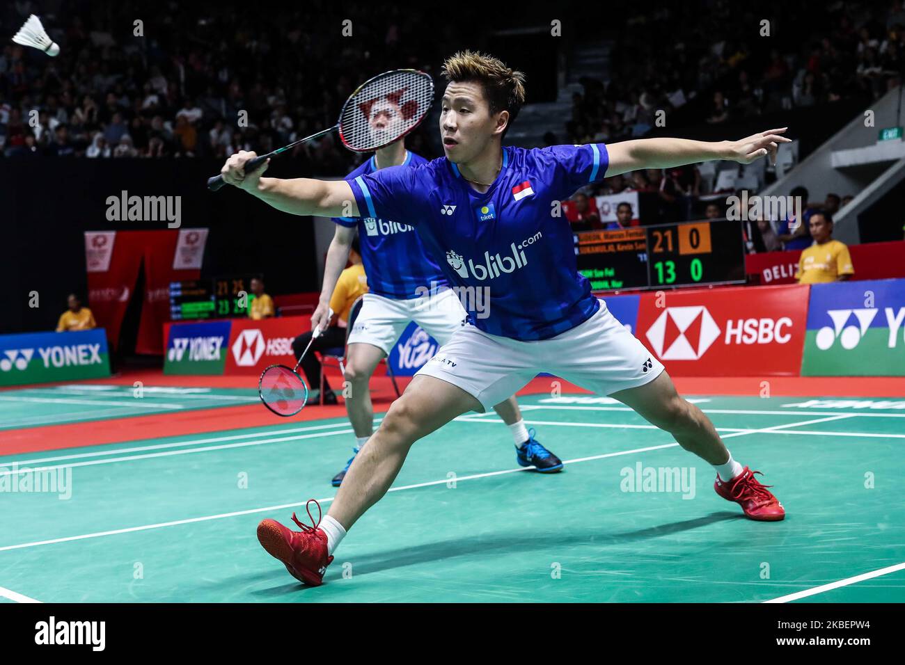 Marcus Fernaldi Gideon (R) and Kevin Sanjaya Sukamuljo (L) of Indonesia competes in the Men's Double quarter final match against Aaron Chia and Soh Wooi Yik of Malaysia on day four of the Daihatsu Indonesia Master at Istora Gelora Bung Karno on January 17, 2020 in Jakarta, Indonesia. (Photo by Andrew Gal/NurPhoto) Stock Photo