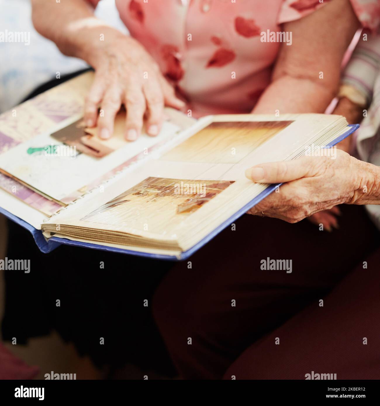 Looking at photo album hi-res stock photography and images - Alamy