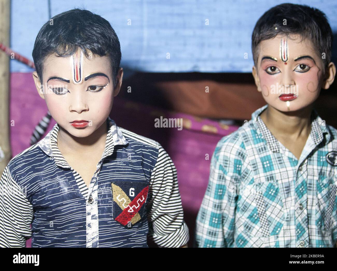 Boys actors pictured at the dressing room before the performance of Mahabharat on Majuli Island, Assam, India on 5 March, 2019. Only men and boys play in the performance, women are forbidden to perform. The theatrical performance is to ensure a successful and fruitful harvest. (Photo by Krystof Kriz/NurPhoto) Stock Photo