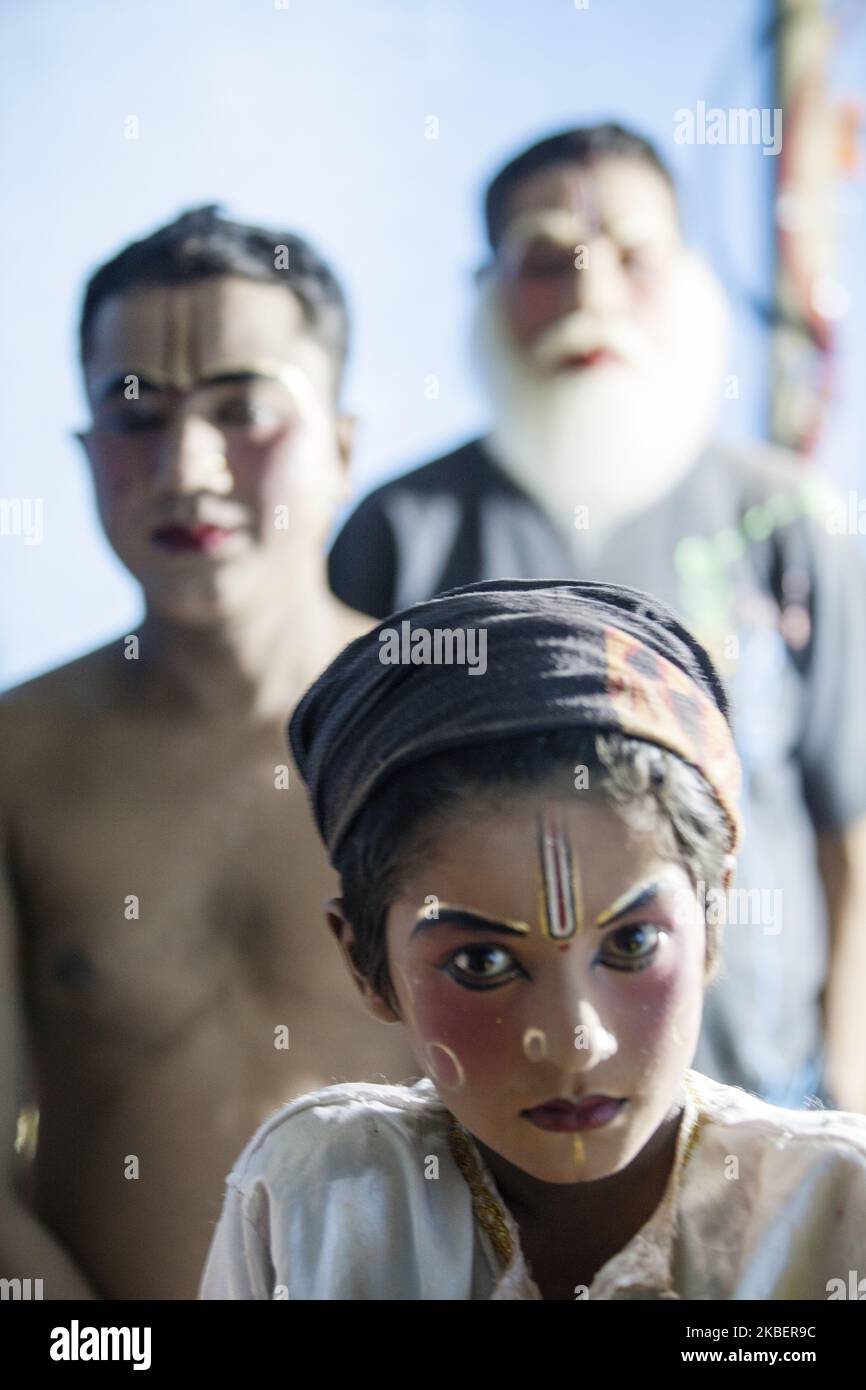 Boys actors pictured at the dressing room before the performance of Mahabharat on Majuli Island, Assam, India on 5 March, 2019. Only men and boys play in the performance, women are forbidden to perform. The theatrical performance is to ensure a successful and fruitful harvest. (Photo by Krystof Kriz/NurPhoto) Stock Photo