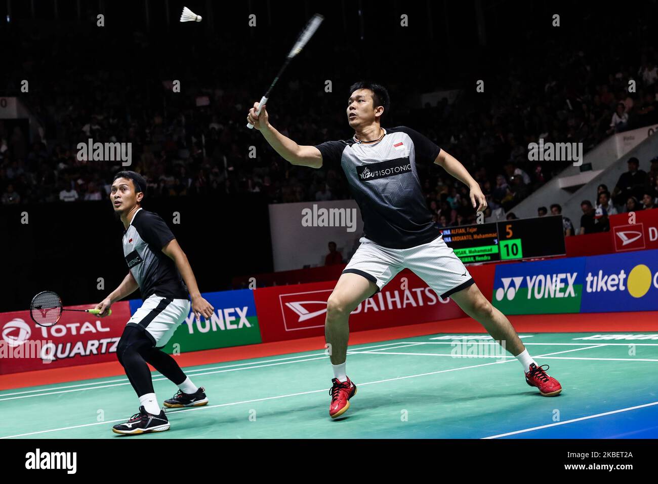 Mohammad Ahsan (L) and Hendra Setiawan (R) of Indonesia competes in the Men Doubles semi-final match against Fajar Alfian and Muhammad Rian Ardianto of Indonesia on day five of the Daihatsu Indonesia Master at Istora Gelora Bung Karno on January 18, 2020, in Jakarta, Indonesia. (Photo by Andrew Gal/NurPhoto) Stock Photo