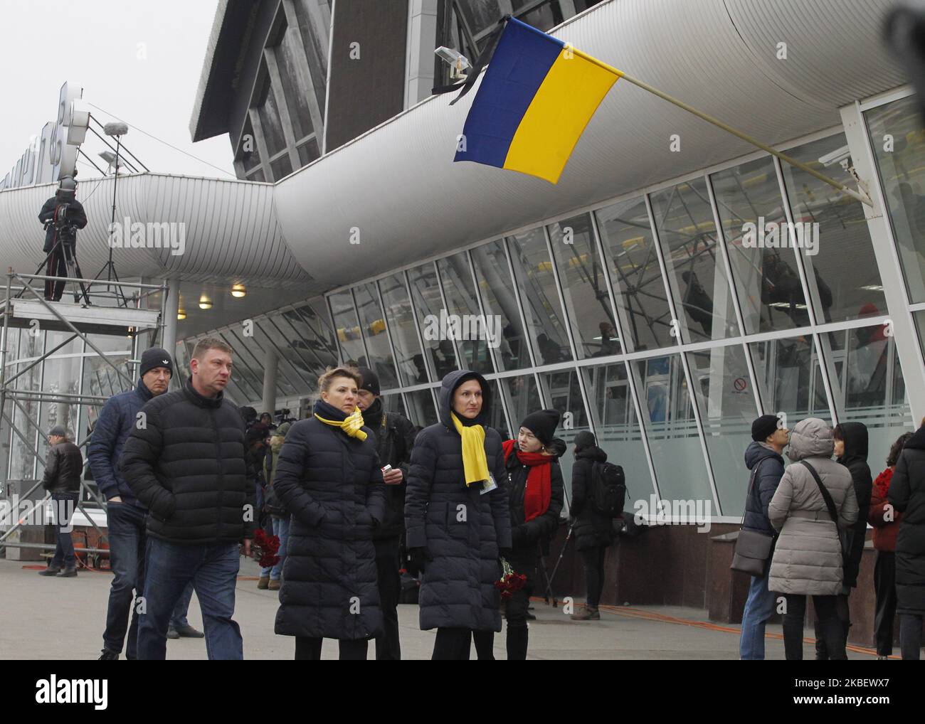 Relatives and friends arrive to a ceremony honoring the memory of victims in the crash of the flight 752 of the Ukraine International Airlines in Iran, upon arrival to the Boryspil Airport near Kiev, Ukraine, on 19 January, 2020. The bodies of Ukrainians, 9 crew members of the Ukraine International Airlines (UIA) and 2 passengers, dead the plane crash in Iran, were handed over from Iran to Ukraine. (Photo by STR/NurPhoto) Stock Photo