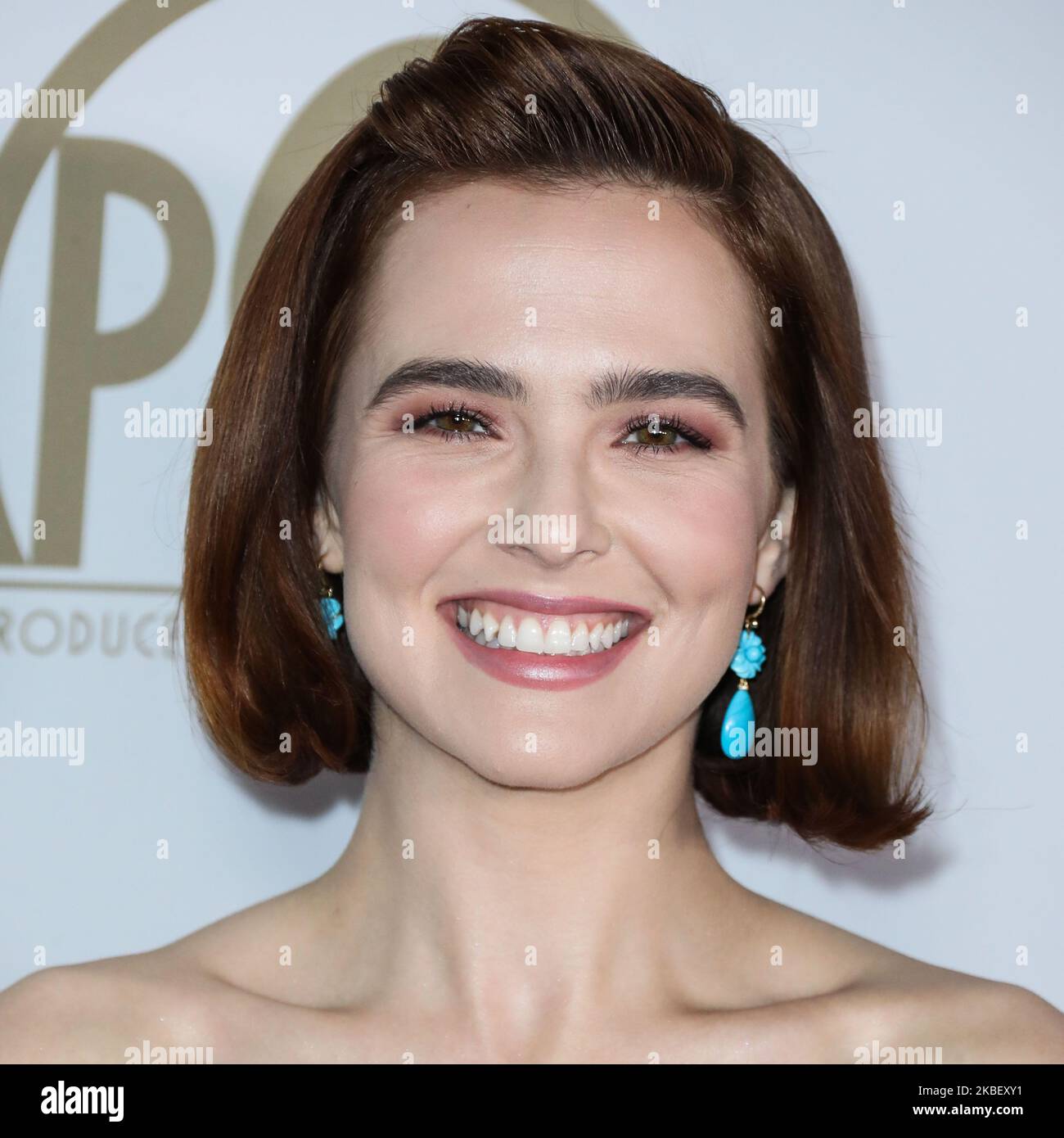 HOLLYWOOD, LOS ANGELES, CALIFORNIA, USA - JANUARY 18: Actress Zoey Deutch wearing an Oscar de la Renta gown, Irene Neuwirth earrings, and Christian Louboutin heels arrives at the 31st Annual Producers Guild Awards held at the Hollywood Palladium on January 18, 2020 in Hollywood, Los Angeles, California, United States. (Photo by Xavier Collin/Image Press Agency/NurPhoto) Stock Photo