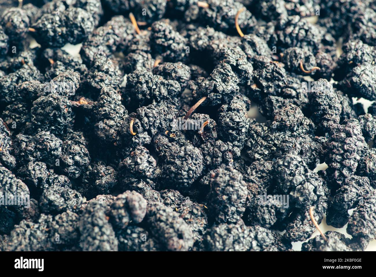 Organic Dried Black Mulberries,healthy food concept Stock Photo