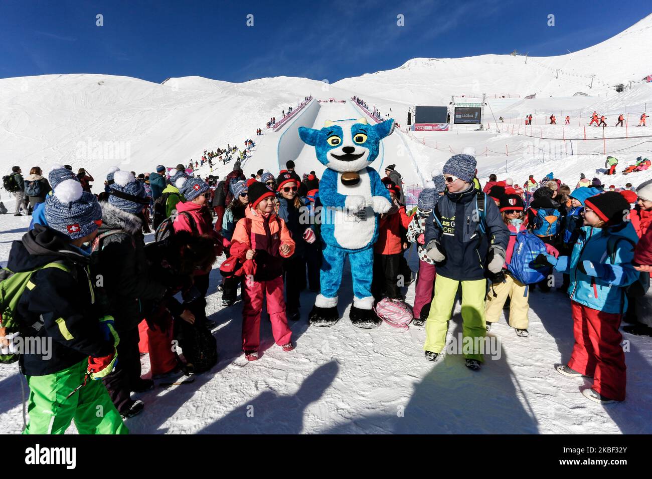 Official mascot dances with children during Men's Halfpipe Finals on 12. day of Winter Youth Olympic Games Lausanne 2020 in Leysin Park & Pipe, Switzerland on January 21, 2020. (Photo by Dominika Zarzycka/NurPhoto) Stock Photo