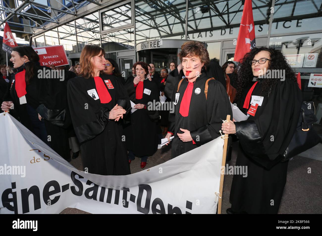 A dozen of lawyers and from the avocature, made an action on the square of the high court of Bobigny, France, the tGI, on 22 January 2020, to protest against the pension reform of the governement. They sang some song, made a rugby Aka, to show their anger. (Photo by Michel Stoupak/NurPhoto) Stock Photo