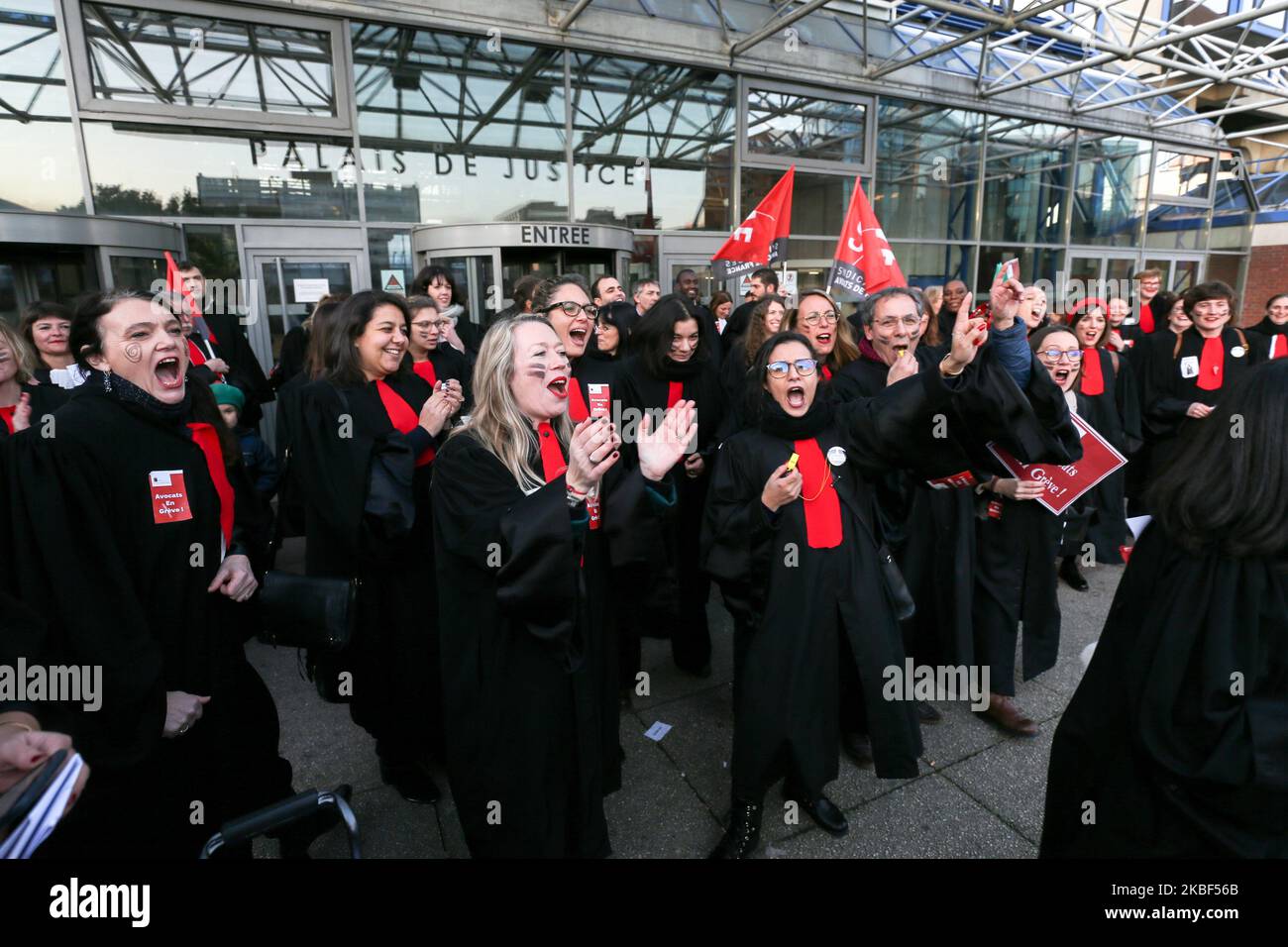 A dozen of lawyers and from the avocature, made an action on the square of the high court of Bobigny, France, the tGI, on 22 January 2020, to protest against the pension reform of the governement. They sang some song, made a rugby Aka, to show their anger. (Photo by Michel Stoupak/NurPhoto) Stock Photo