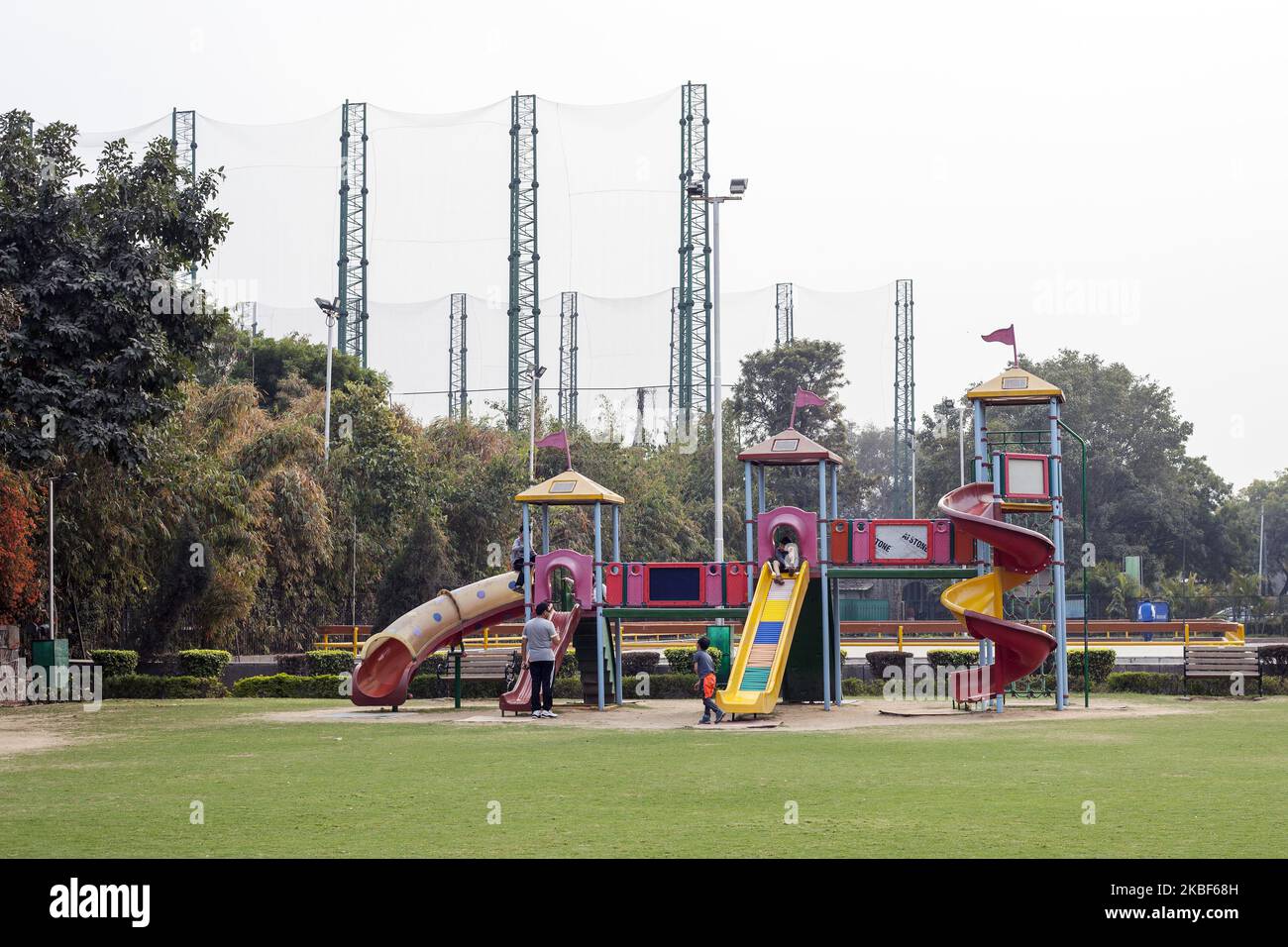 Children playground with slides pictured at Siri Fort Complex, New Delhi India on 24 February 2019. Siri Fort Complex is sport complex in South Delhi, it consists of children playgrounds, roller blades arena, swimming pool, badminton, tennis and football grounds. Siri Fort is located in the affluent and expats area of Delhi. Siri Fort is also one of the most polluted places with heavy air pollution which can be seen in the hazy sky. (Photo by Krystof Kriz/NurPhoto) Stock Photo
