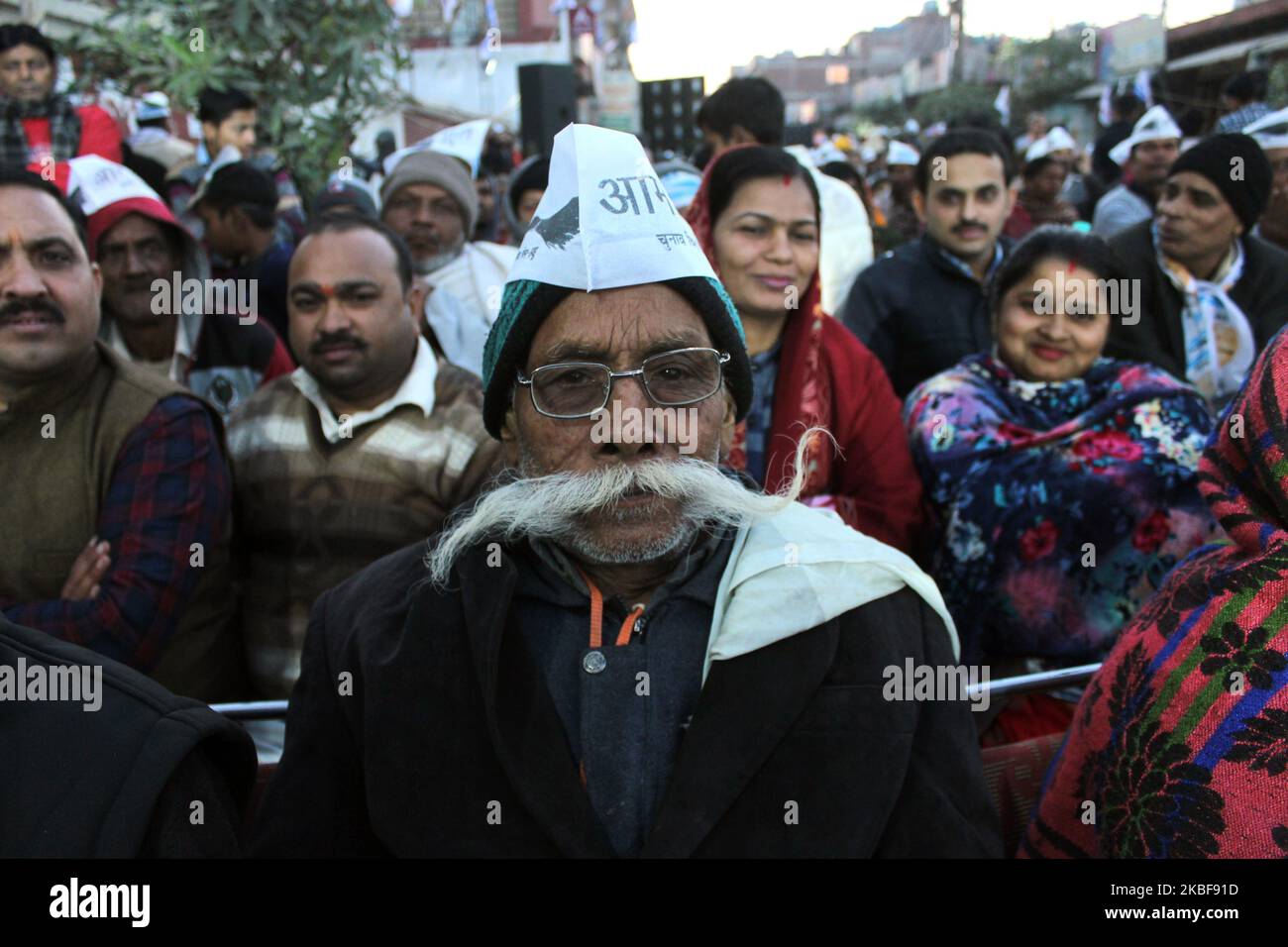 Supporters of Aam Aadmi Party cheer Delhi's Chief Minister Arvind Kejriwal during a public gathering while campaigning ahead of Delhi Assembly elections at Nangloi Jat on January 24, 2020 in New Delhi, India. (Photo by Mayank Makhija/NurPhoto) Stock Photo