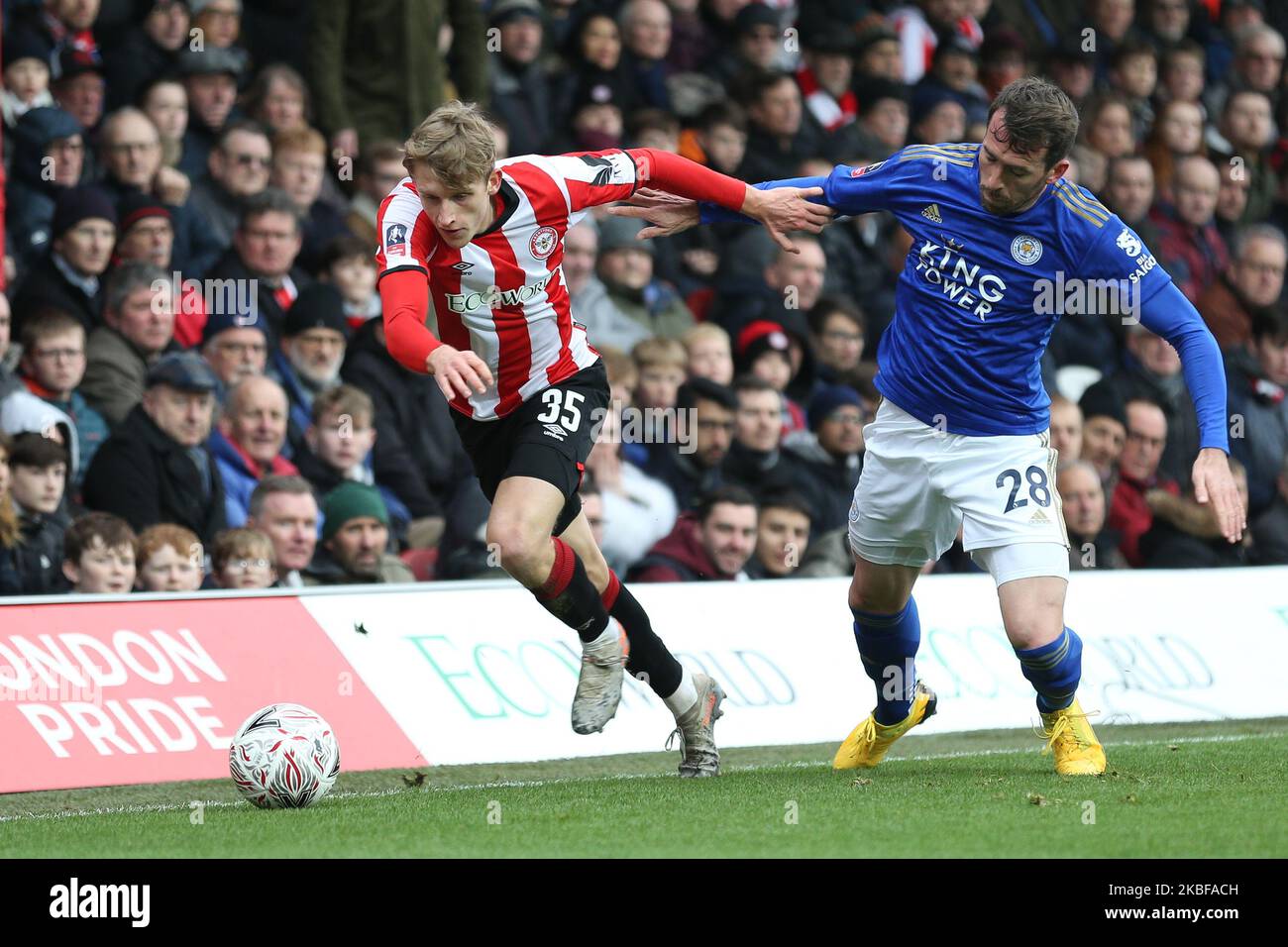 Mads Roerslev Rasmussen of Brentford getting past Christian Fuchs of Leicester City during the FA Cup match between Brentford and Leicester City at Griffin Park, London on Saturday 25th January 2020. (Photo by Jacques Feeney/MI News/NurPhoto) Stock Photo