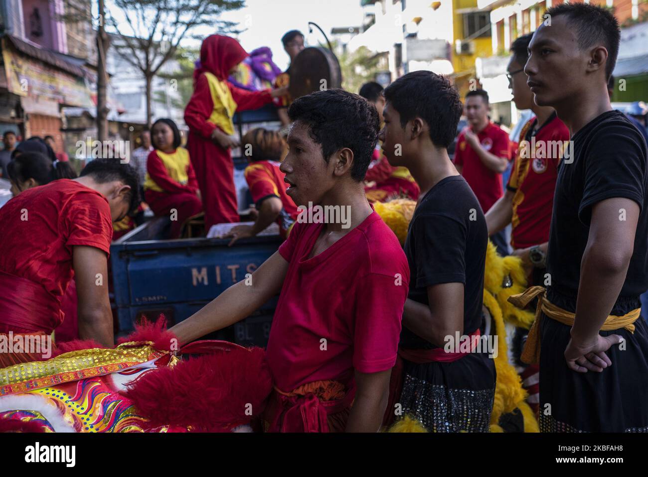 A group of dancers prepares to perform the Chinese traditional dragon ...
