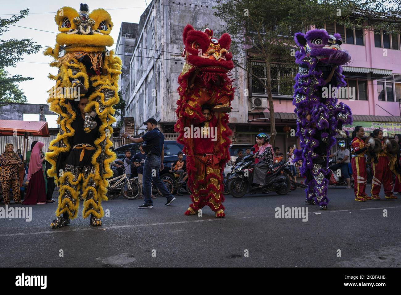 A group of dancers perform the Chinese traditional dragon dance during ...