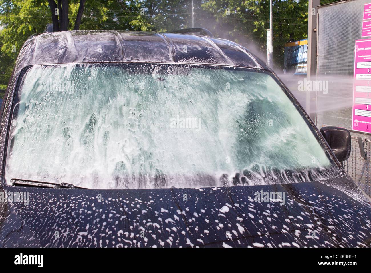 the front window of the car modern foam for car washes Stock Photo Alamy
